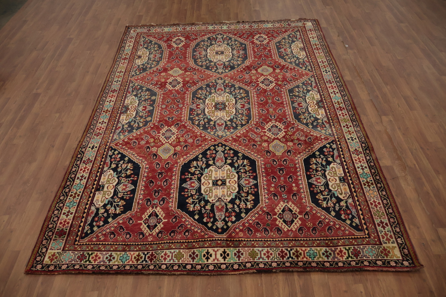 Exquisite Handmade Persian Rug with Rich Red and Blue Hues 7x10