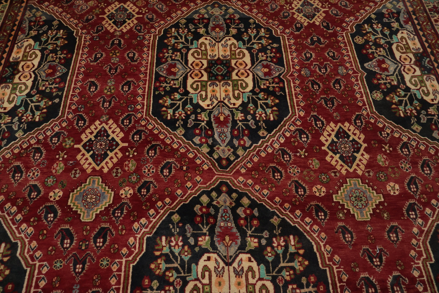 Exquisite Handmade Persian Rug with Rich Red and Blue Hues 7x10