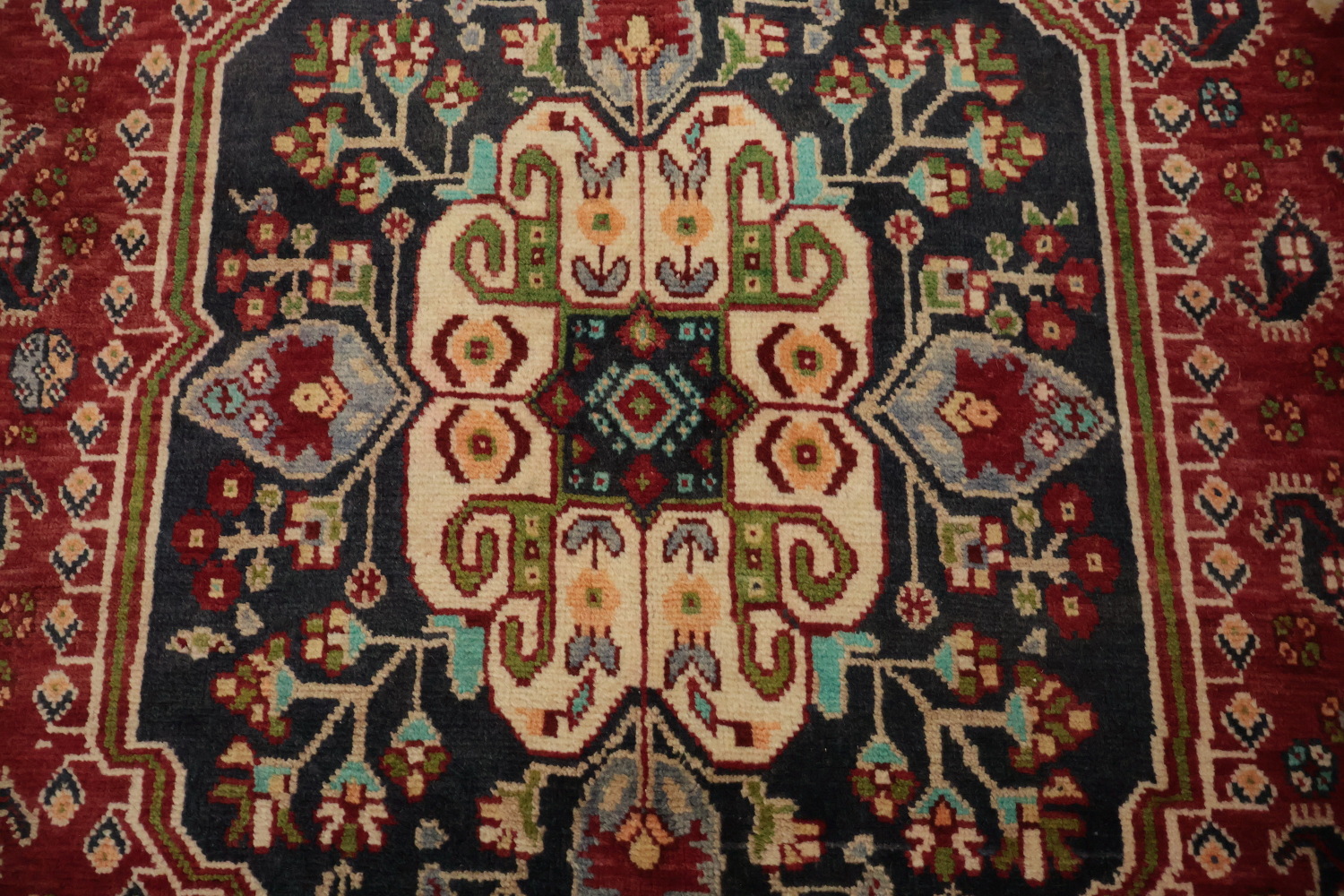 Exquisite Handmade Persian Rug with Rich Red and Blue Hues 7x10