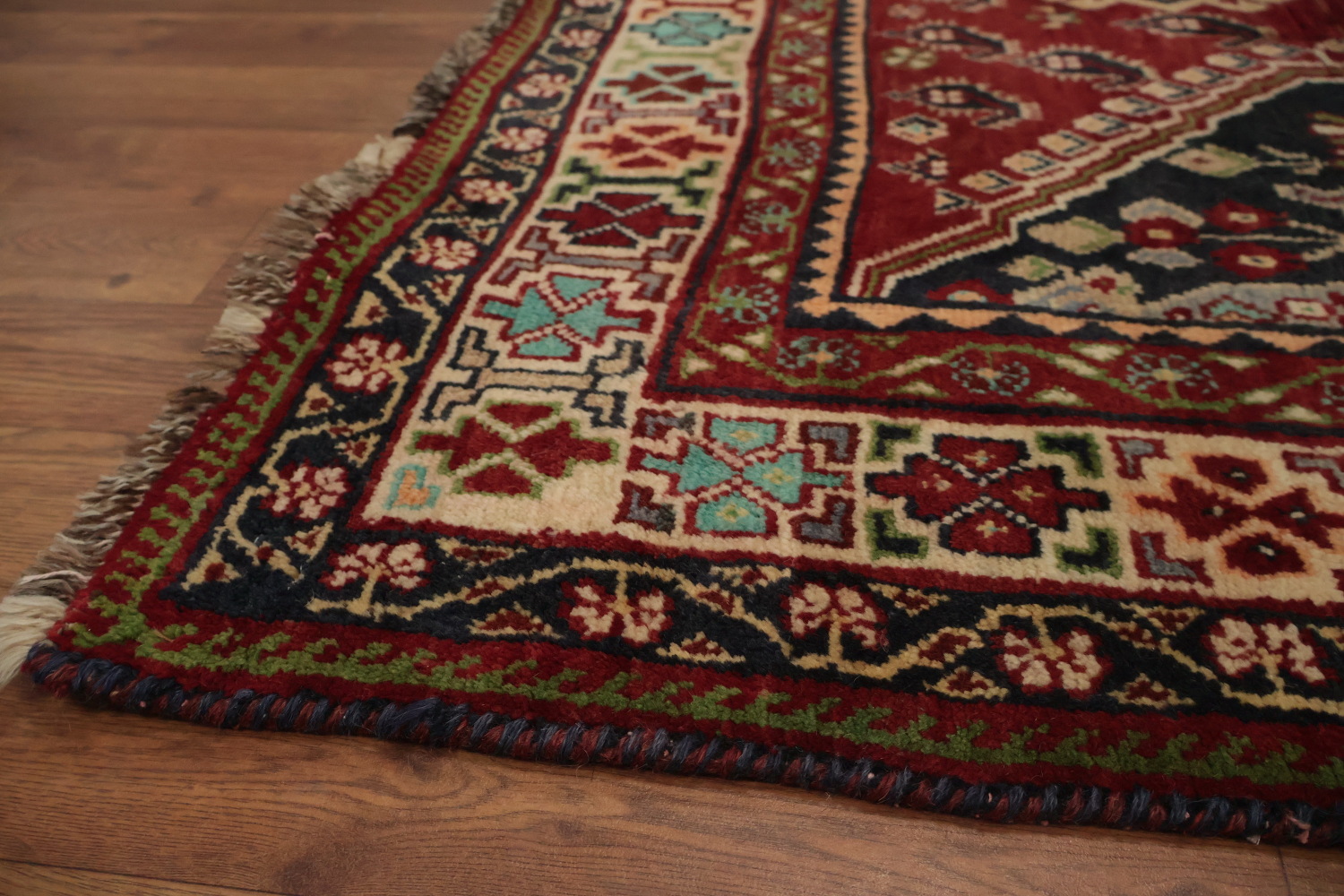 Exquisite Handmade Persian Rug with Rich Red and Blue Hues 7x10