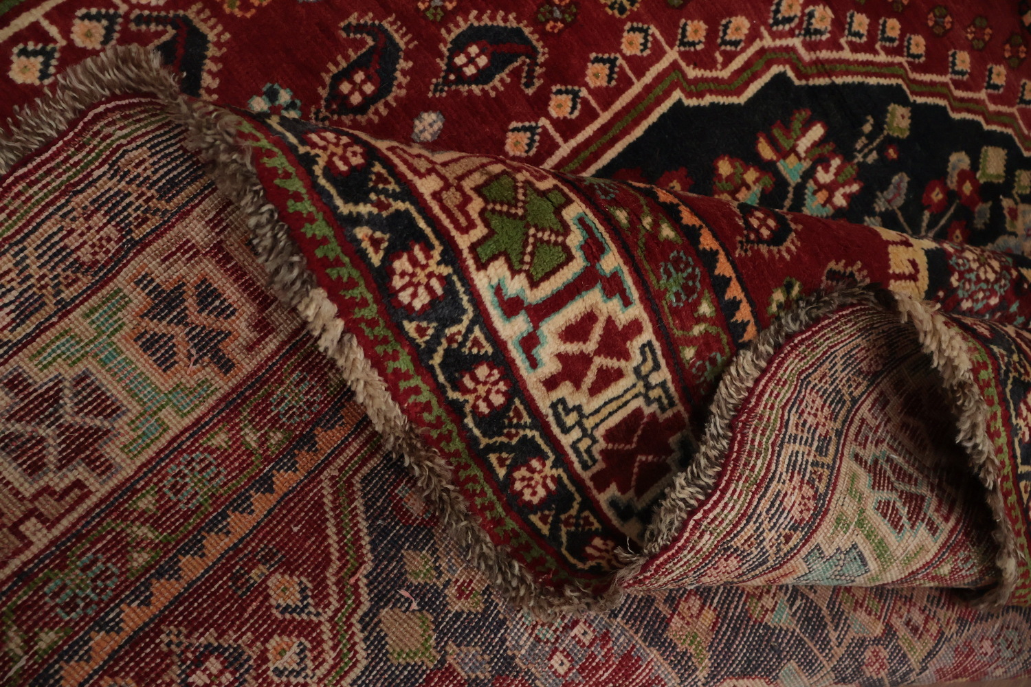 Exquisite Handmade Persian Rug with Rich Red and Blue Hues 7x10