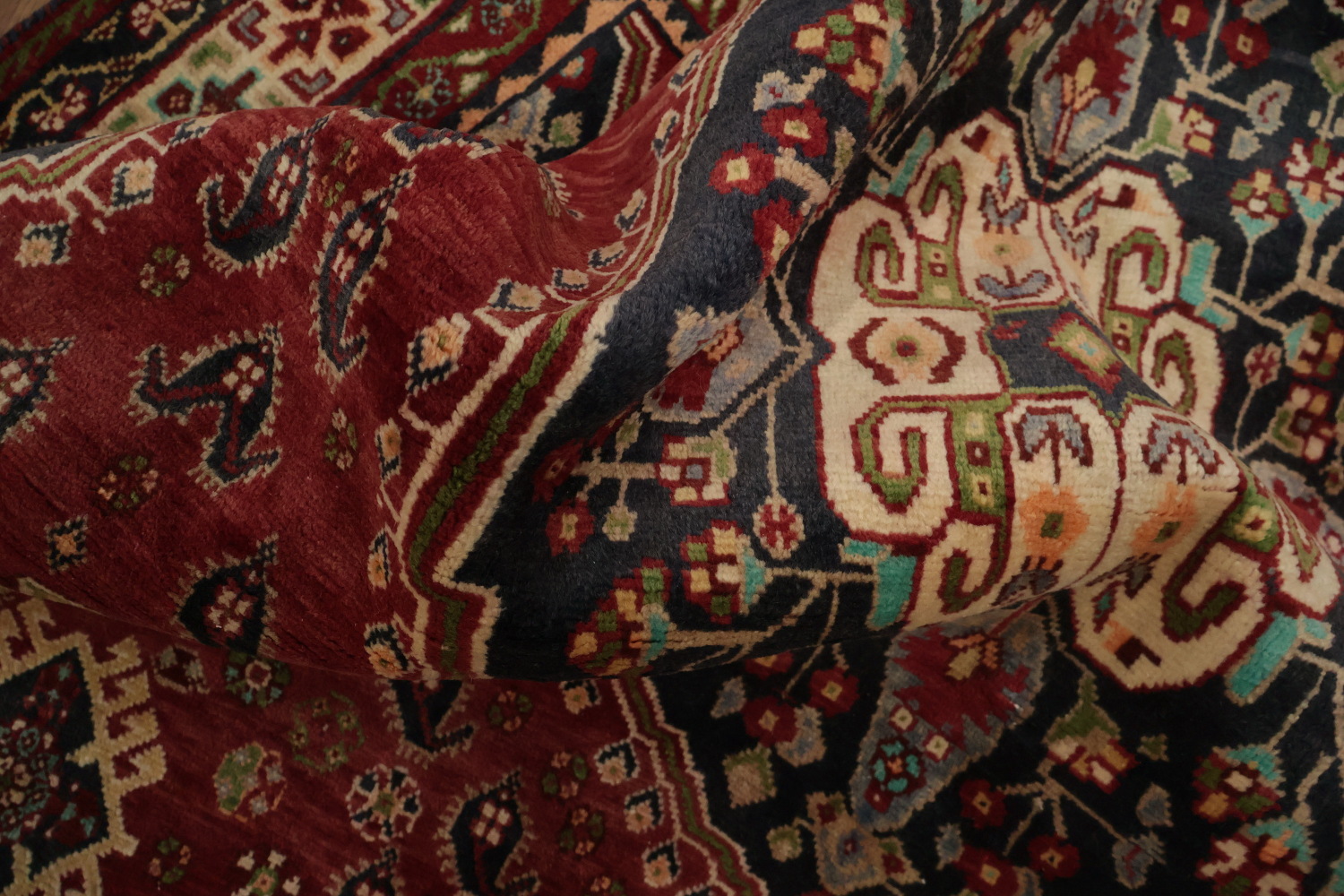 Exquisite Handmade Persian Rug with Rich Red and Blue Hues 7x10