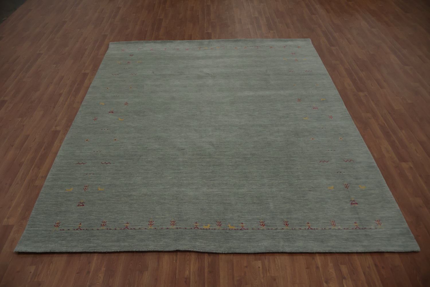 Refined Gabbeh Area Rug 8x10 with Soft Border Tribal Details
