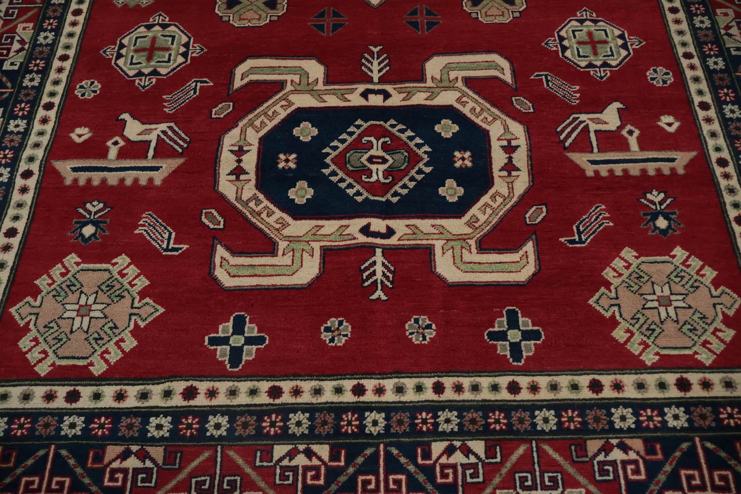 Traditional Red Kazak Rug with Geometric Patterns and Motifs 7x9