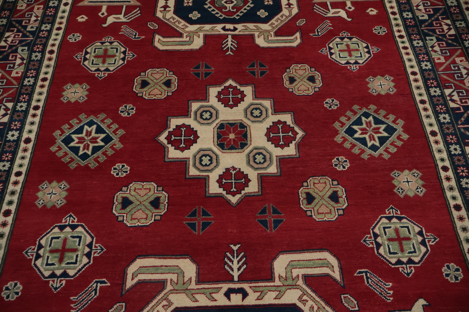 Traditional Red Kazak Rug with Geometric Patterns and Motifs 7x9