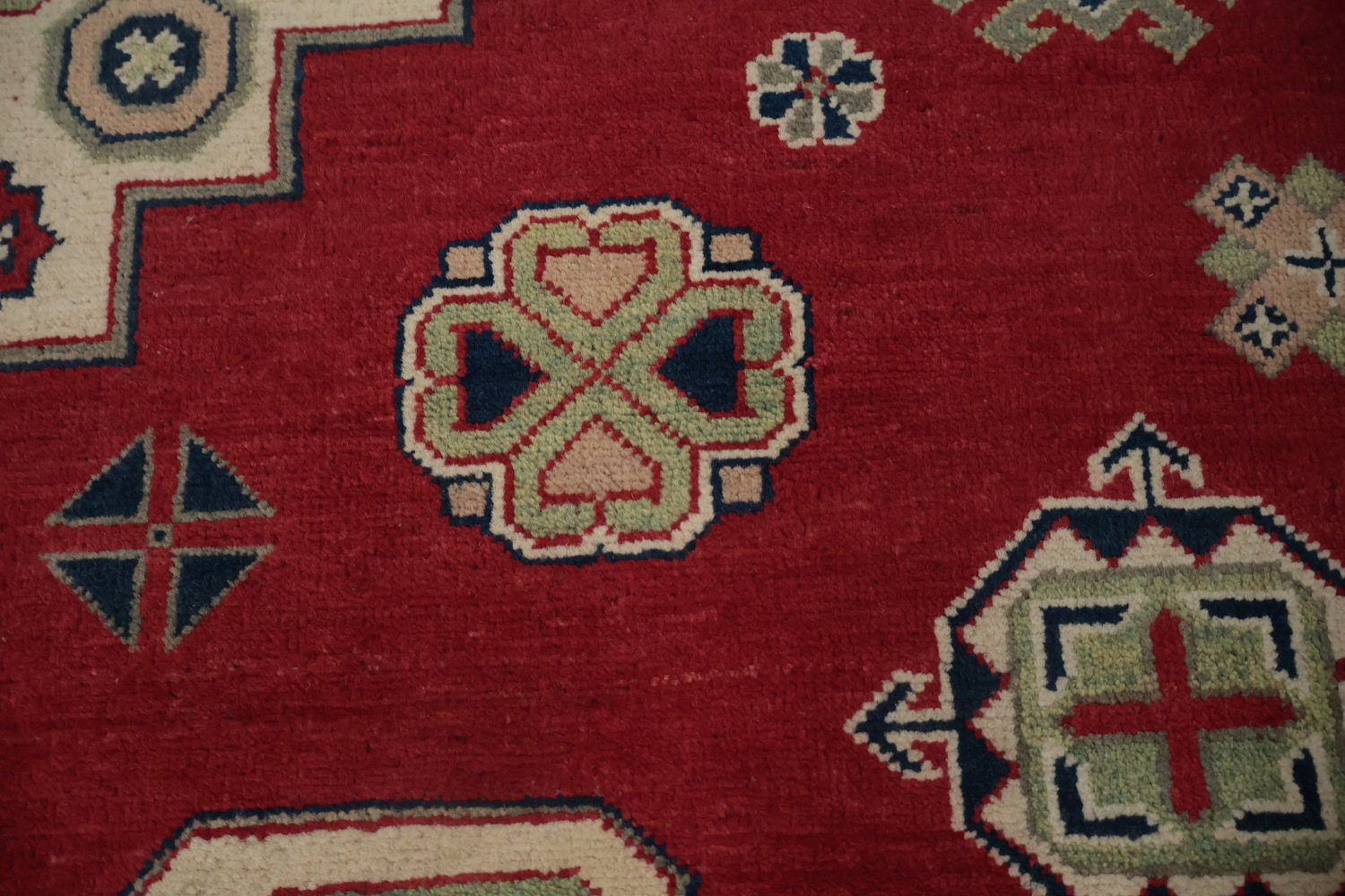 Traditional Red Kazak Rug with Geometric Patterns and Motifs 7x9