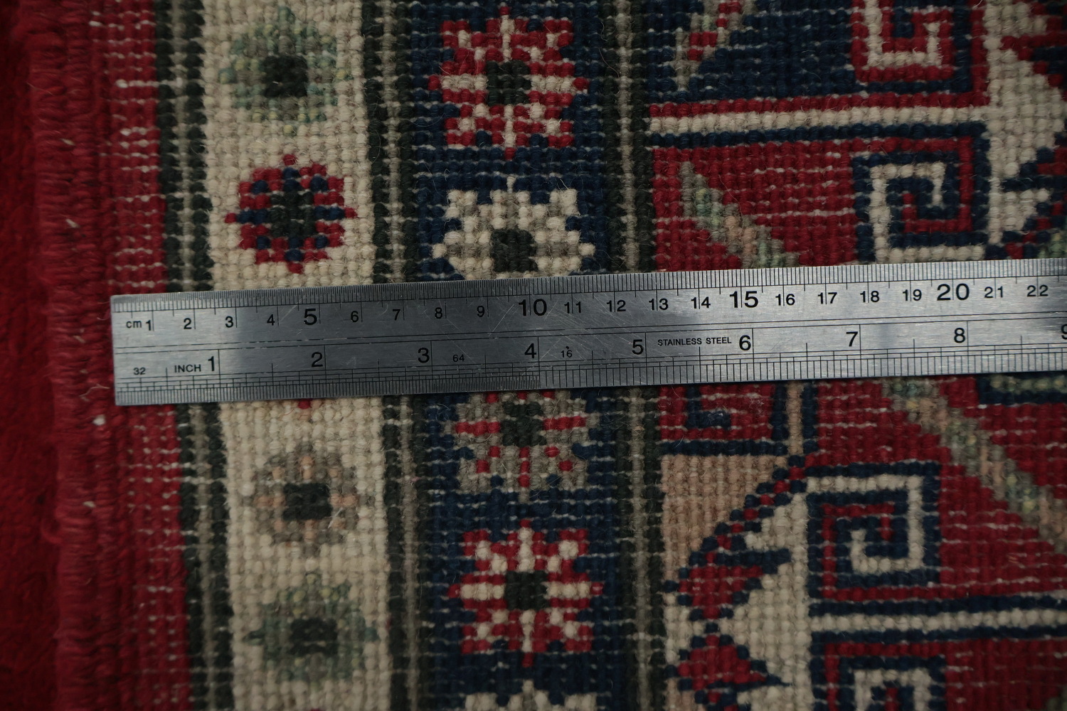 Traditional Red Kazak Rug with Geometric Patterns and Motifs 7x9