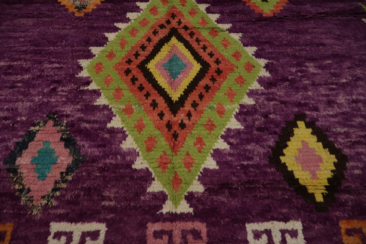 Vibrant Plush Moroccan Area Rug 6x9 with Rich Purple Background