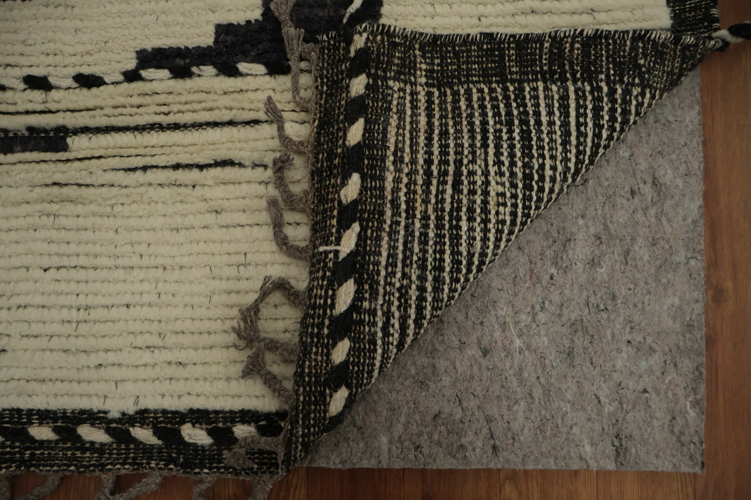 Stylish Neutral-Toned Moroccan Area Rug 7x10 with Artistic Elements