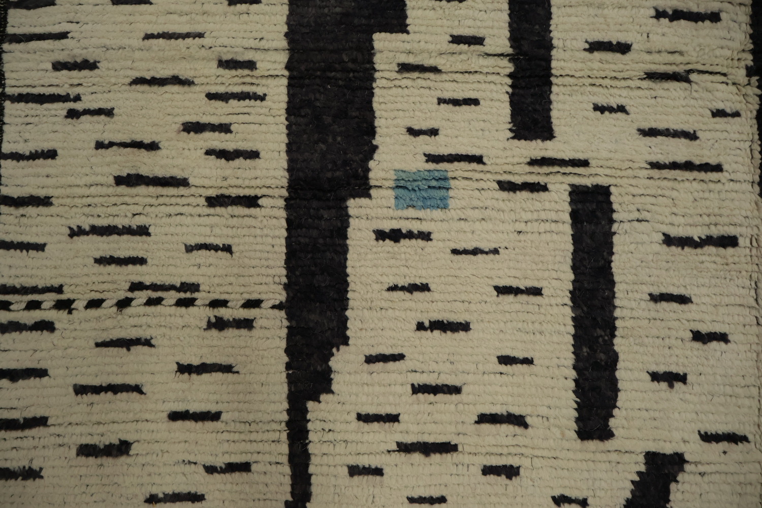 Stylish Neutral-Toned Moroccan Area Rug 7x10 with Artistic Elements