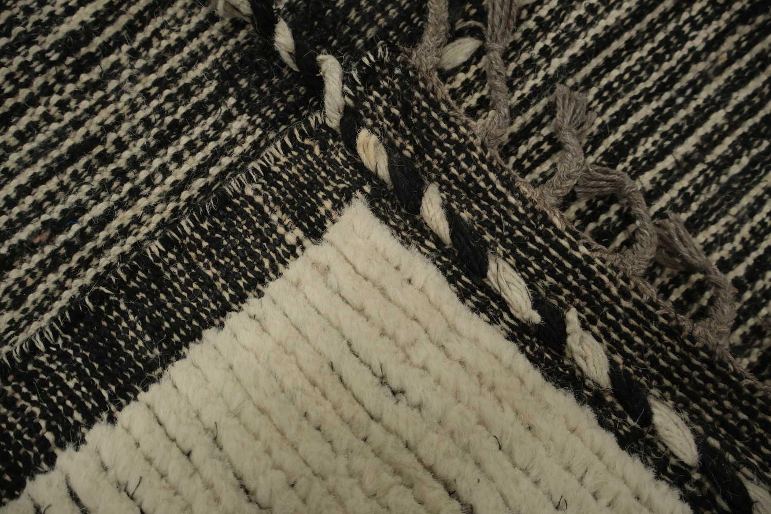 Stylish Neutral-Toned Moroccan Area Rug 7x10 with Artistic Elements