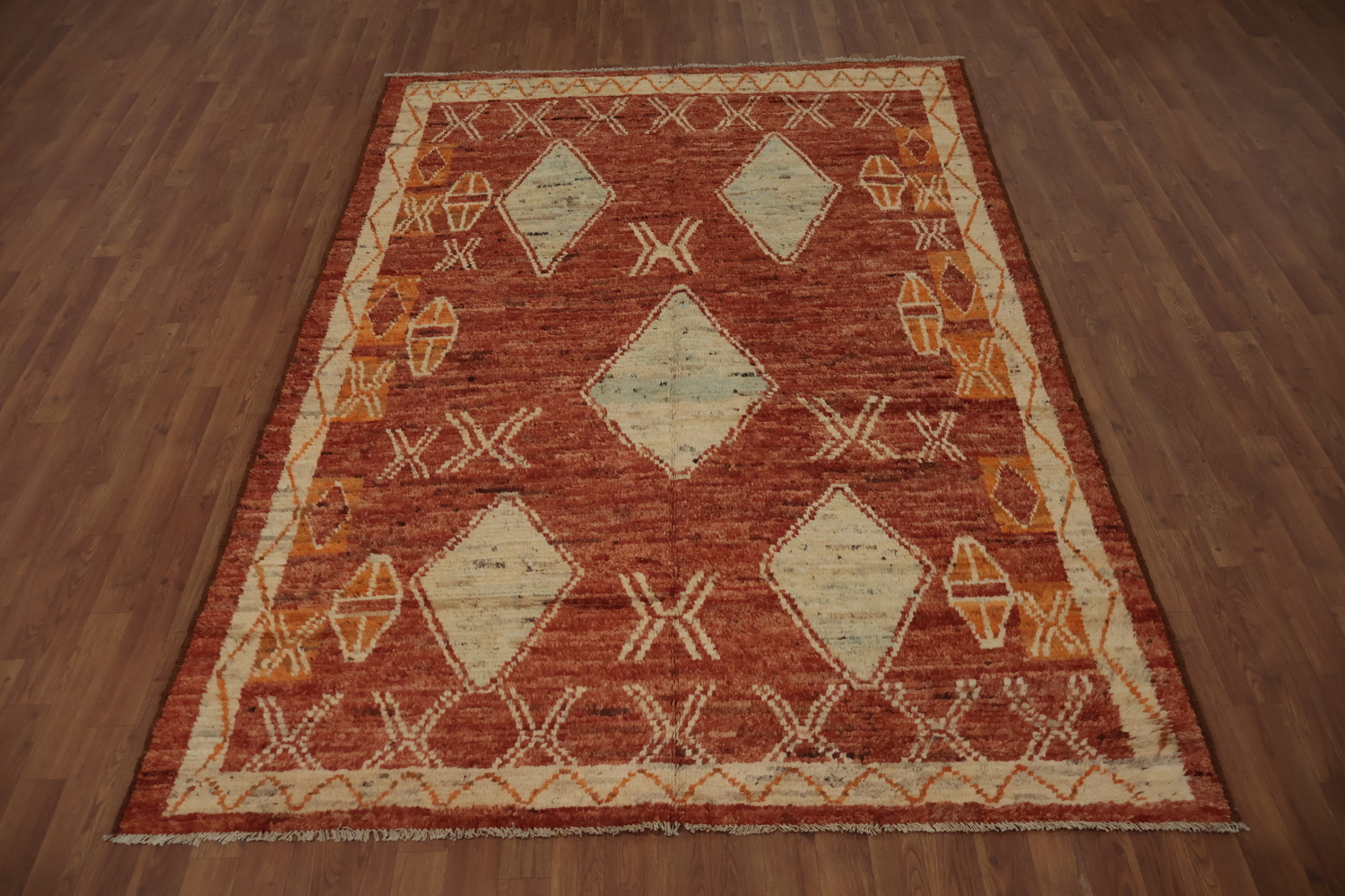 Intricate Tribal Design on a Rich Moroccan Area Rug 6x9