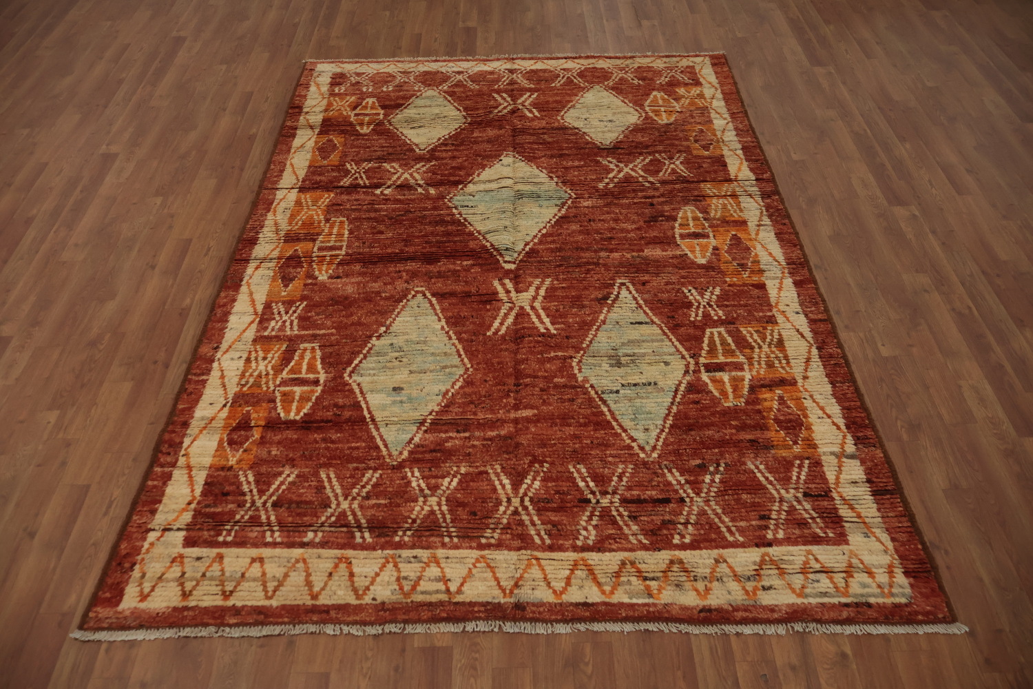 Intricate Tribal Design on a Rich Moroccan Area Rug 6x9