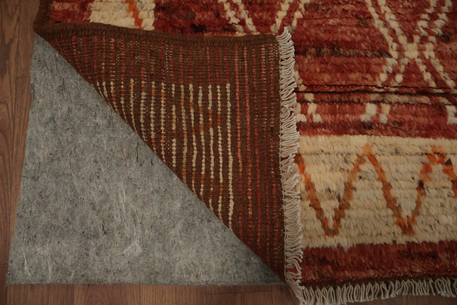Intricate Tribal Design on a Rich Moroccan Area Rug 6x9