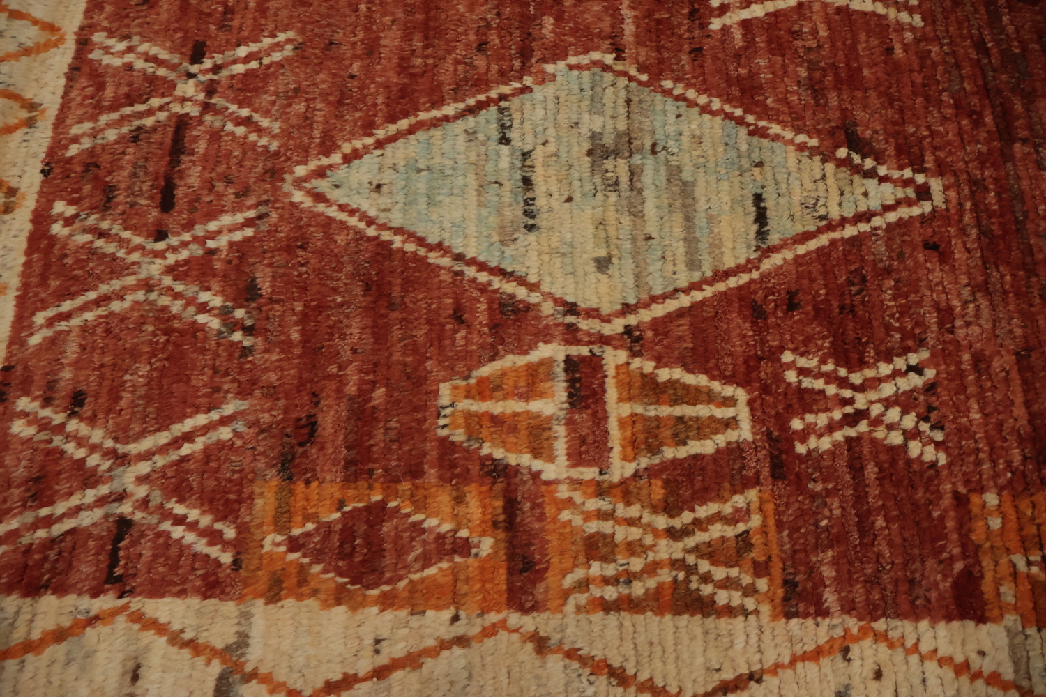 Intricate Tribal Design on a Rich Moroccan Area Rug 6x9