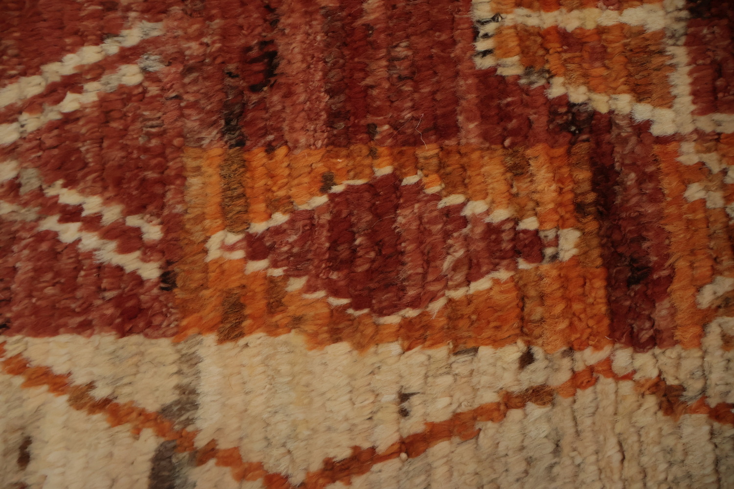Intricate Tribal Design on a Rich Moroccan Area Rug 6x9