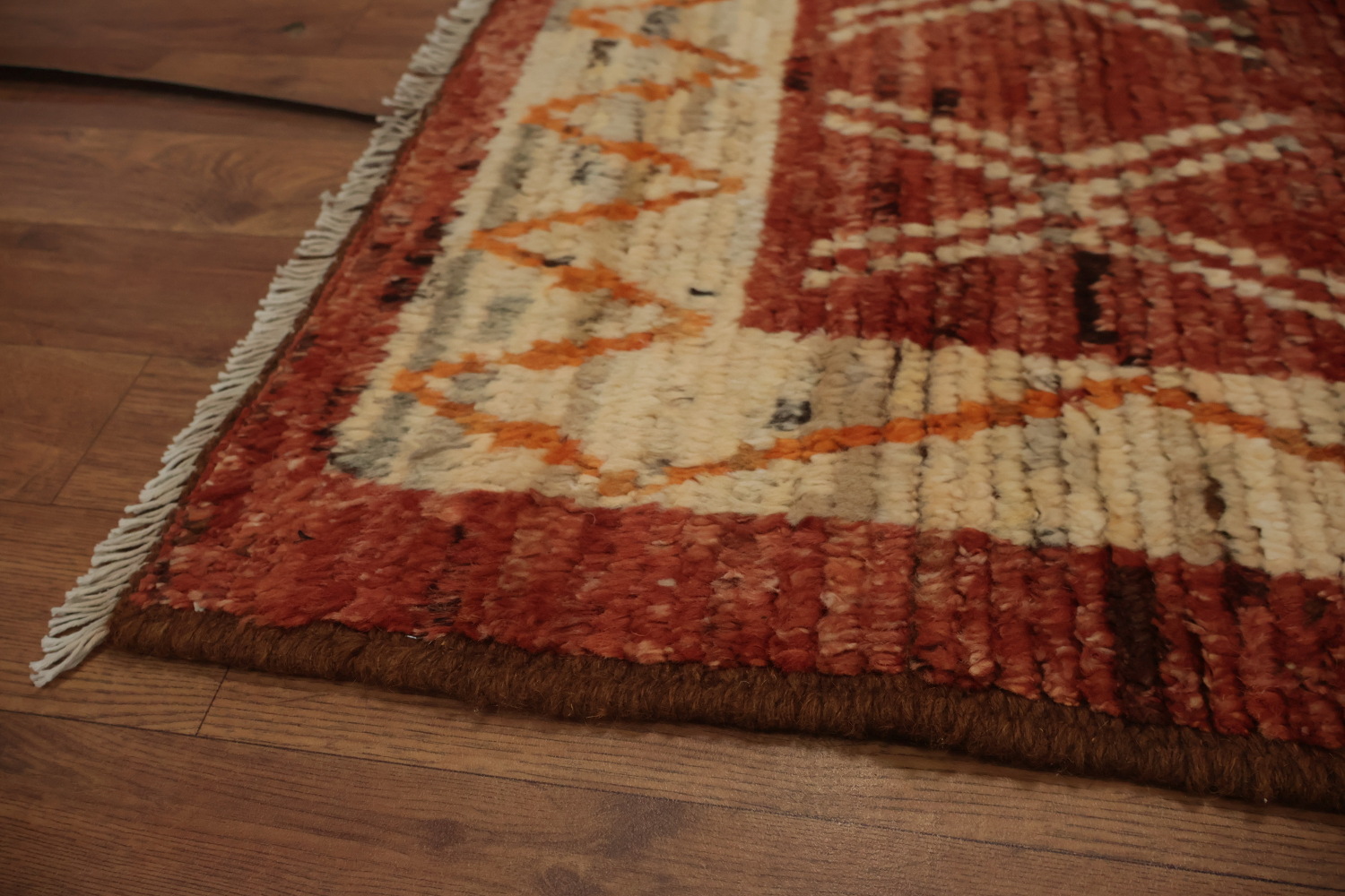 Intricate Tribal Design on a Rich Moroccan Area Rug 6x9