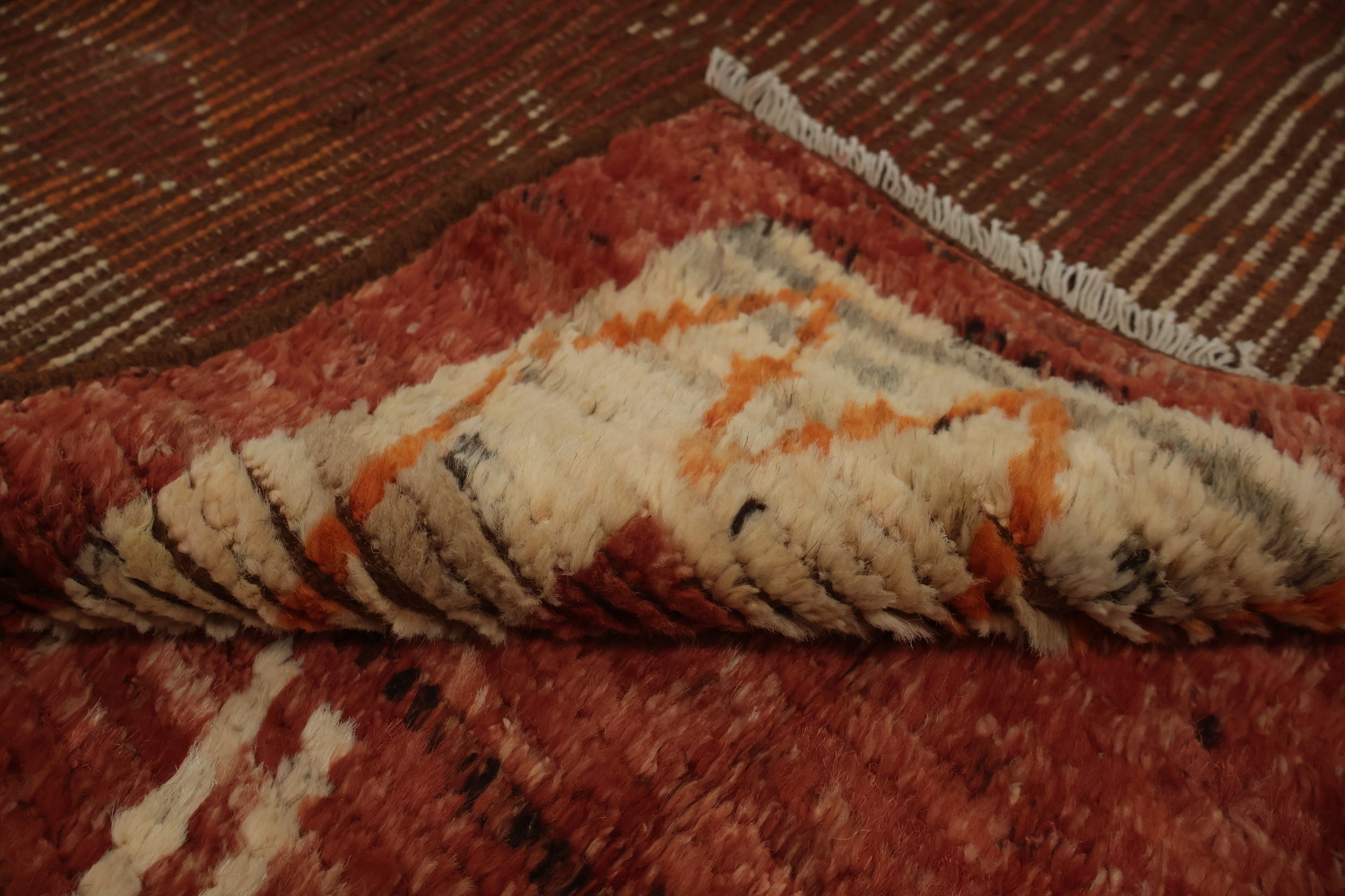Intricate Tribal Design on a Rich Moroccan Area Rug 6x9