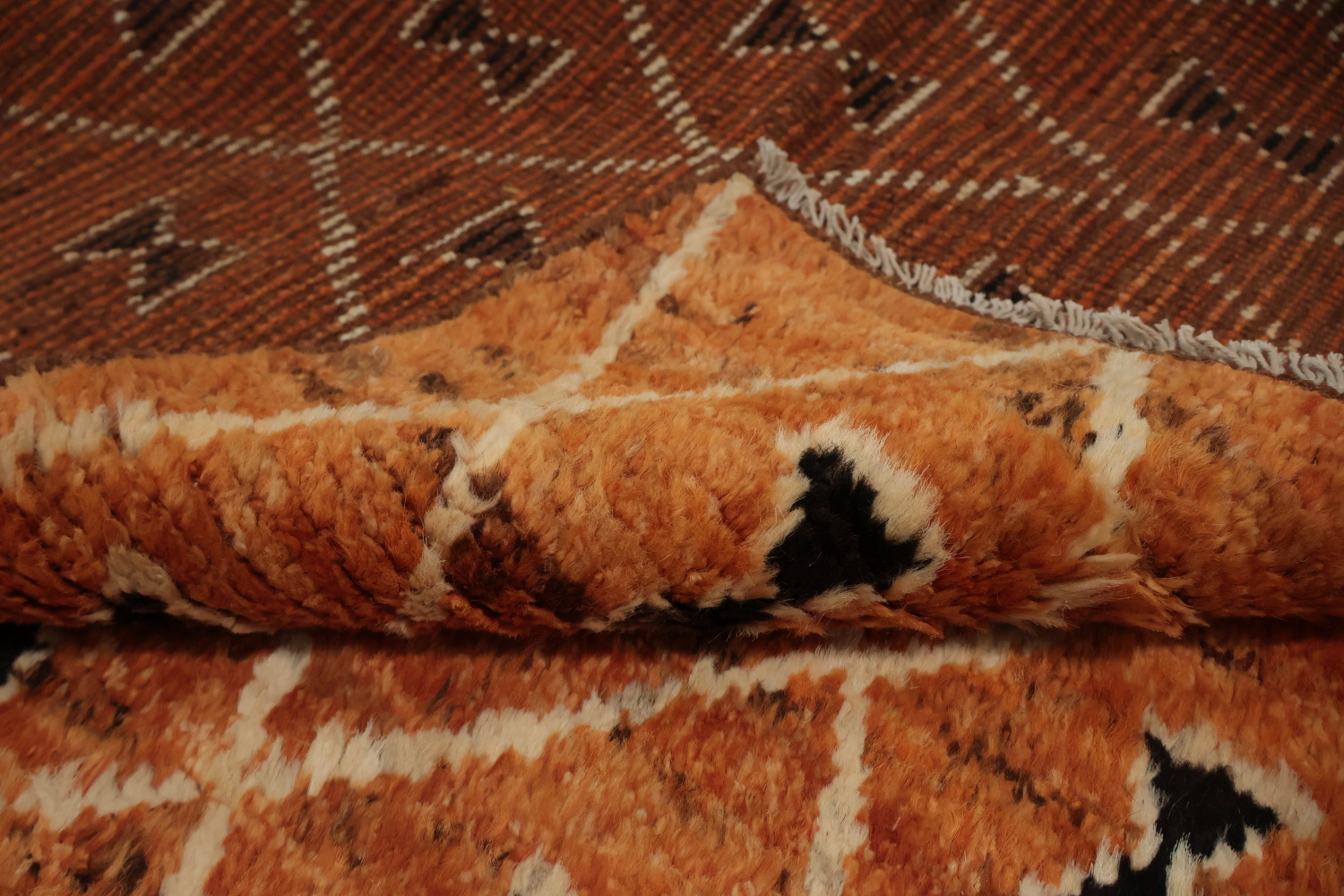 Elegant Orange Moroccan Area Rug 7x10 with Unique Patterns