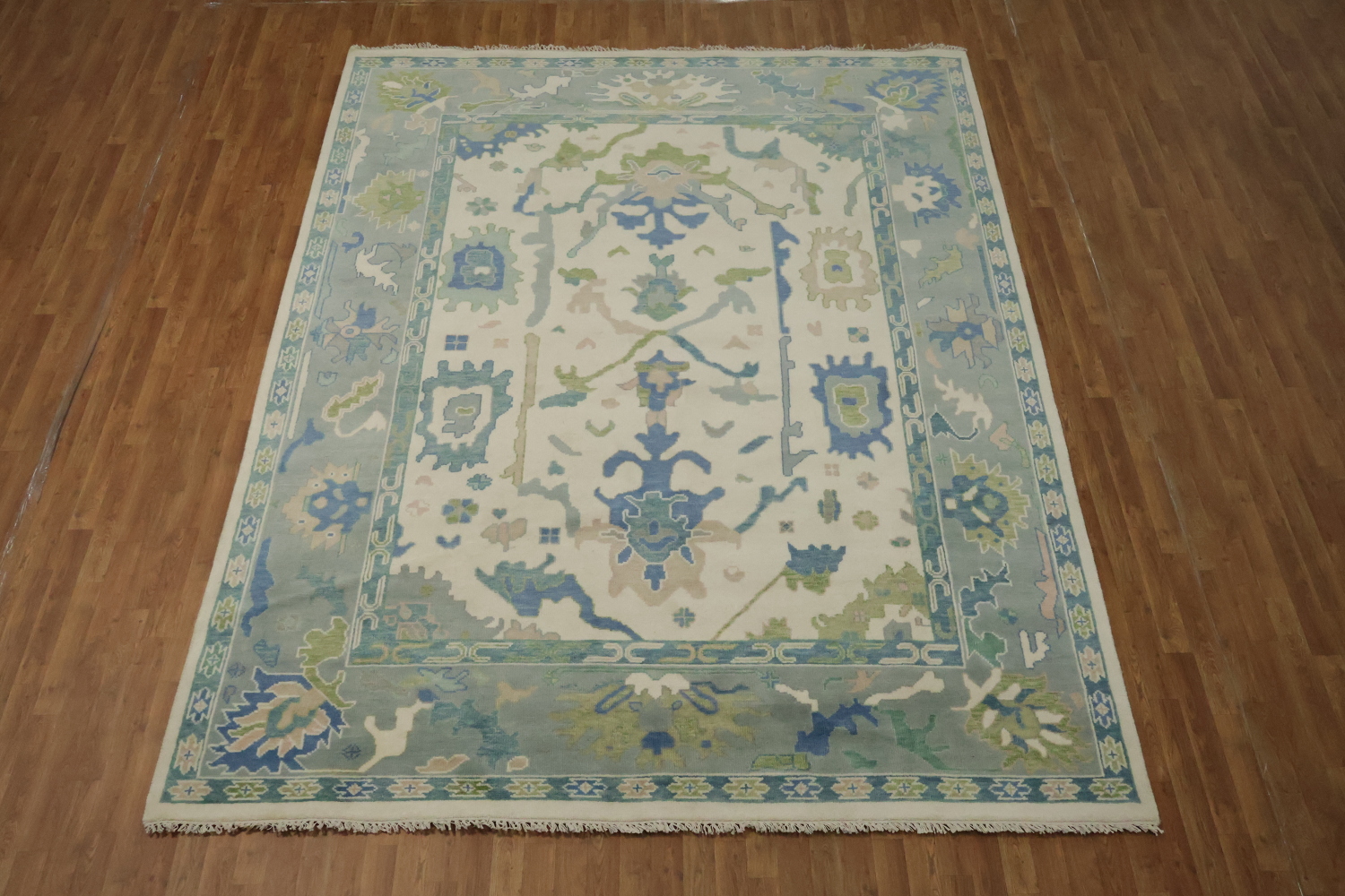 Artistic Blue and Green Oushak Indian Rug with Intricate Floral Designs 9' x 12'