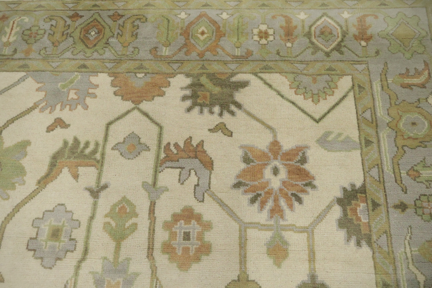 Vintage Inspired Cream Ivory Oushak Area Rug with Soft Green Floral Accents 8' x 10'