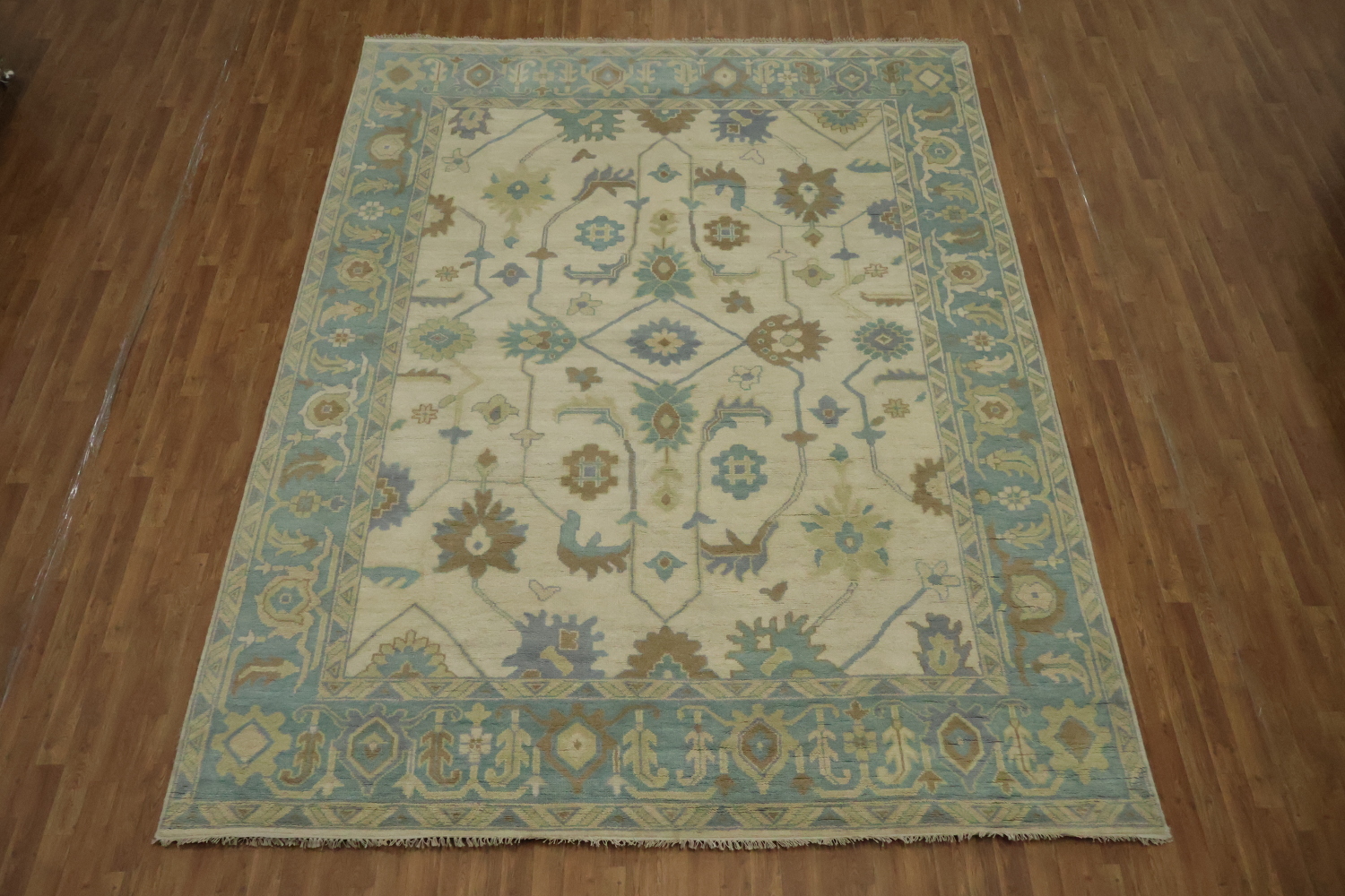 Beige with Blue Border Oushak Hand-Knotted Wool Rug 9' x 12'