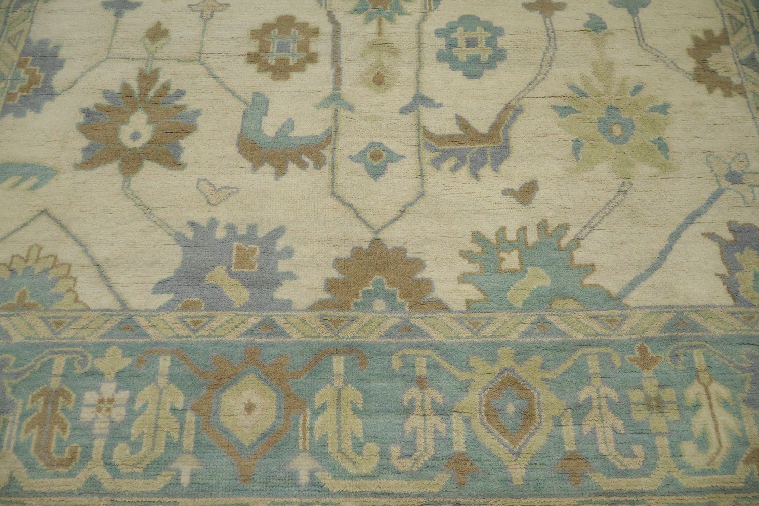 Beige with Blue Border Oushak Hand-Knotted Wool Rug 9' x 12'
