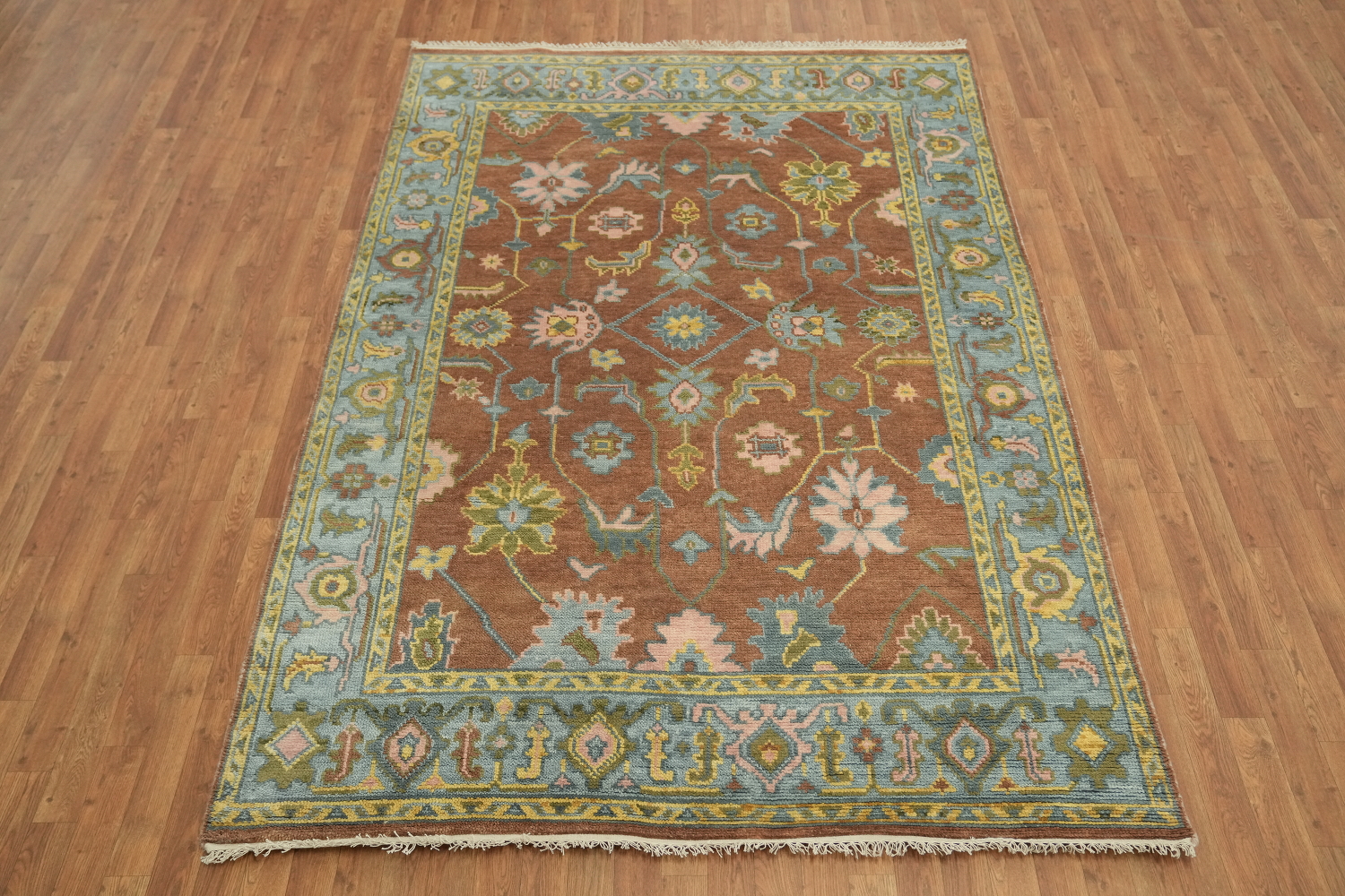 6'x9' Oushak Traditional Wool Area Rug with Soft Rust and Blue Accents