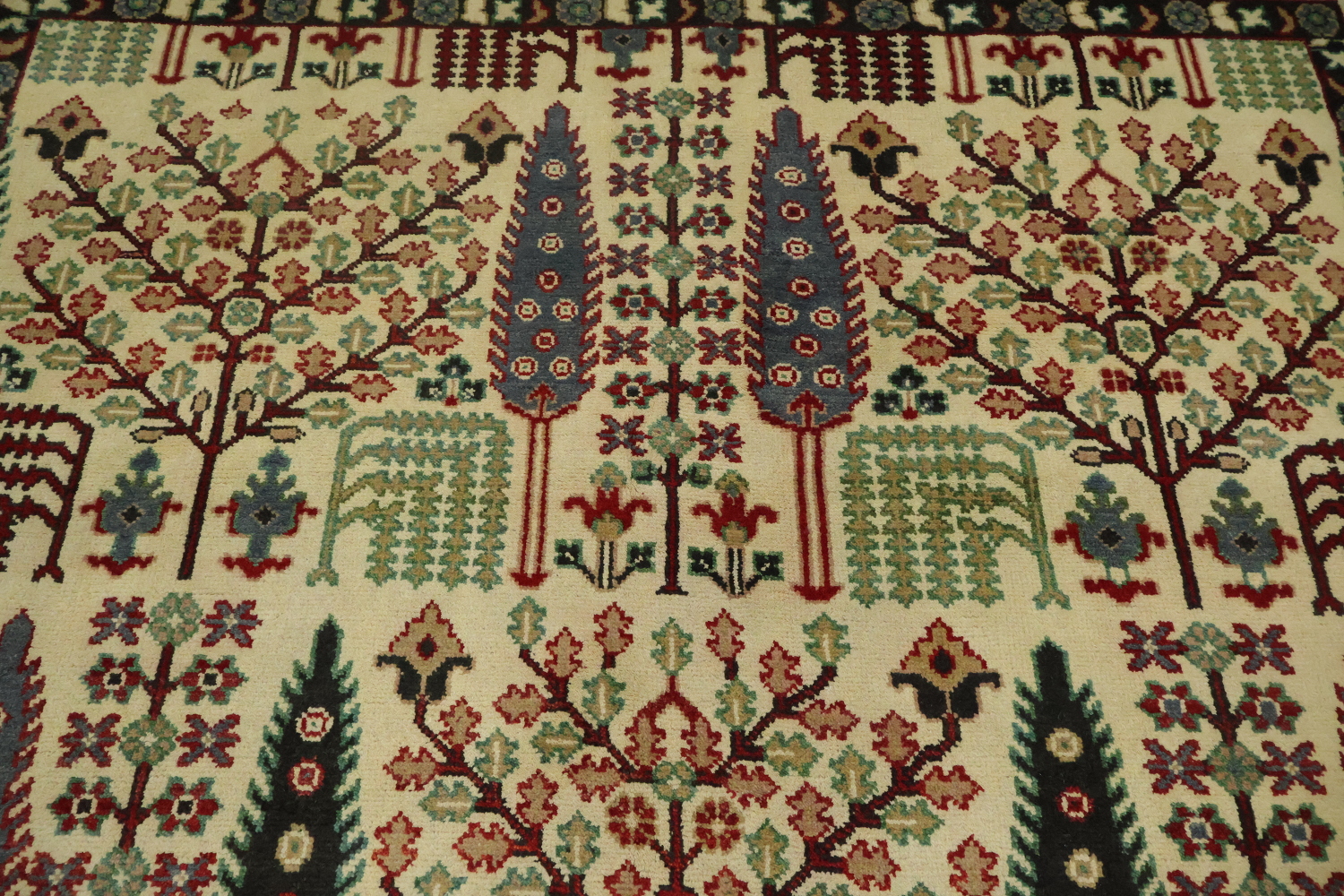 Intricate Tree Designs on a Rustic Decorative Rug 8'x10'