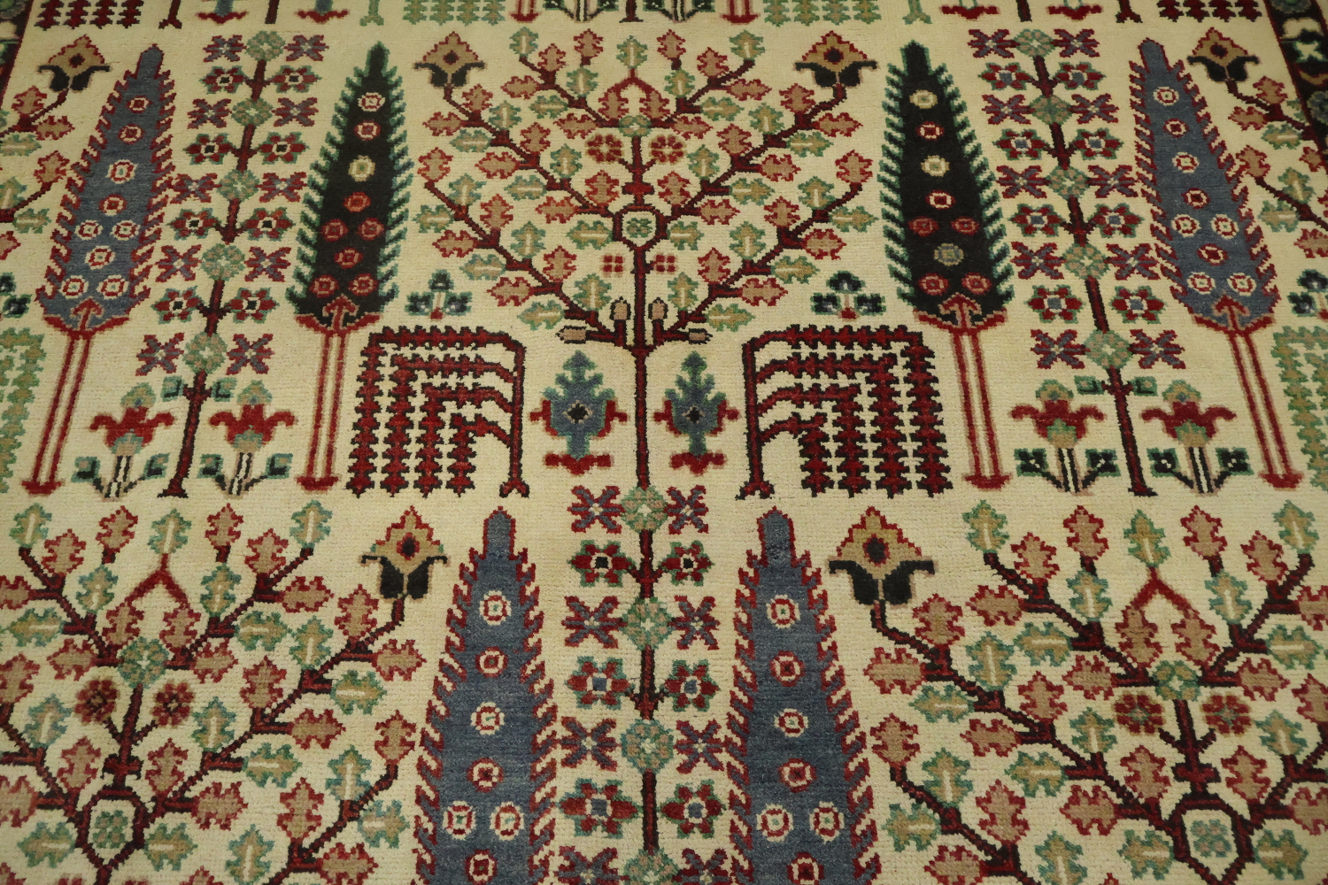 Intricate Tree Designs on a Rustic Decorative Rug 8'x10'