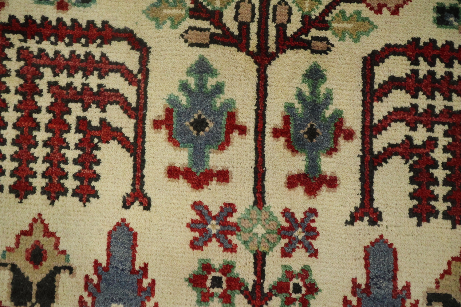 Intricate Tree Designs on a Rustic Decorative Rug 8'x10'