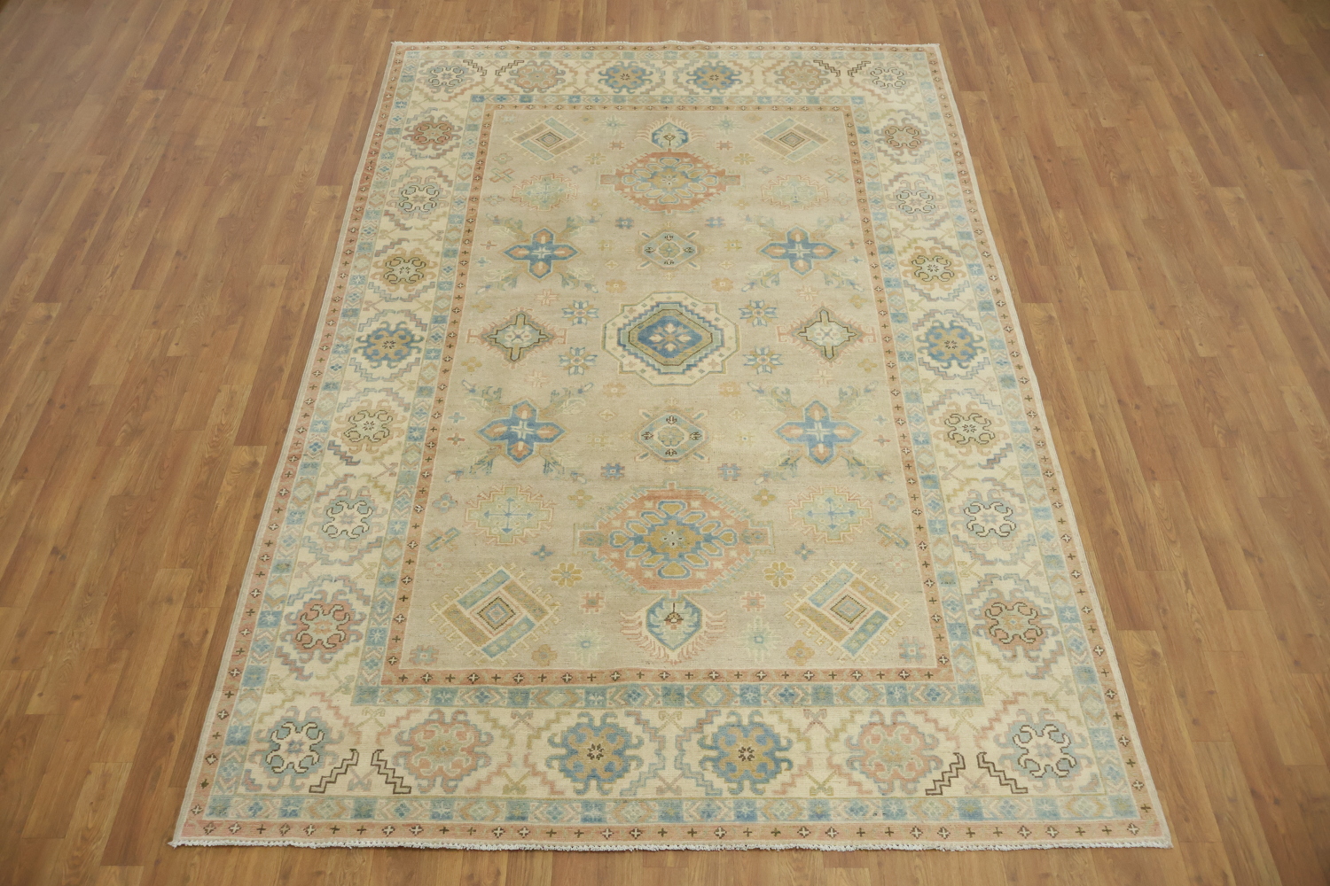 Traditional Light Grey Kazak Pakistani Rug with Delicate Blue and Orange Motifs 6'x9'