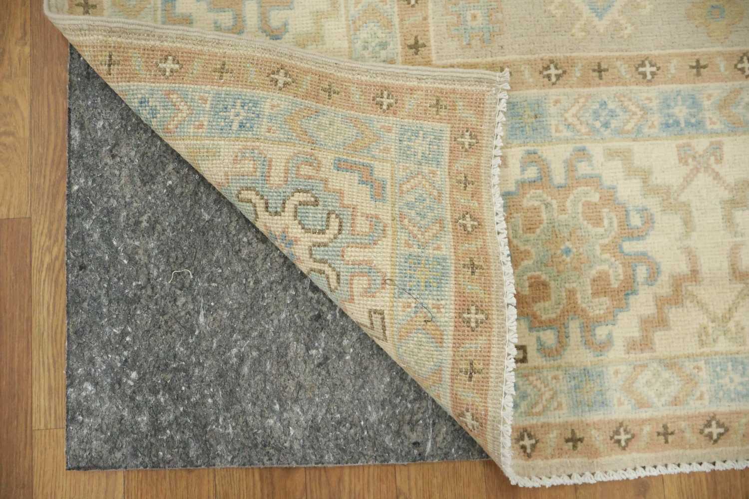Traditional Light Grey Kazak Pakistani Rug with Delicate Blue and Orange Motifs 6'x9'