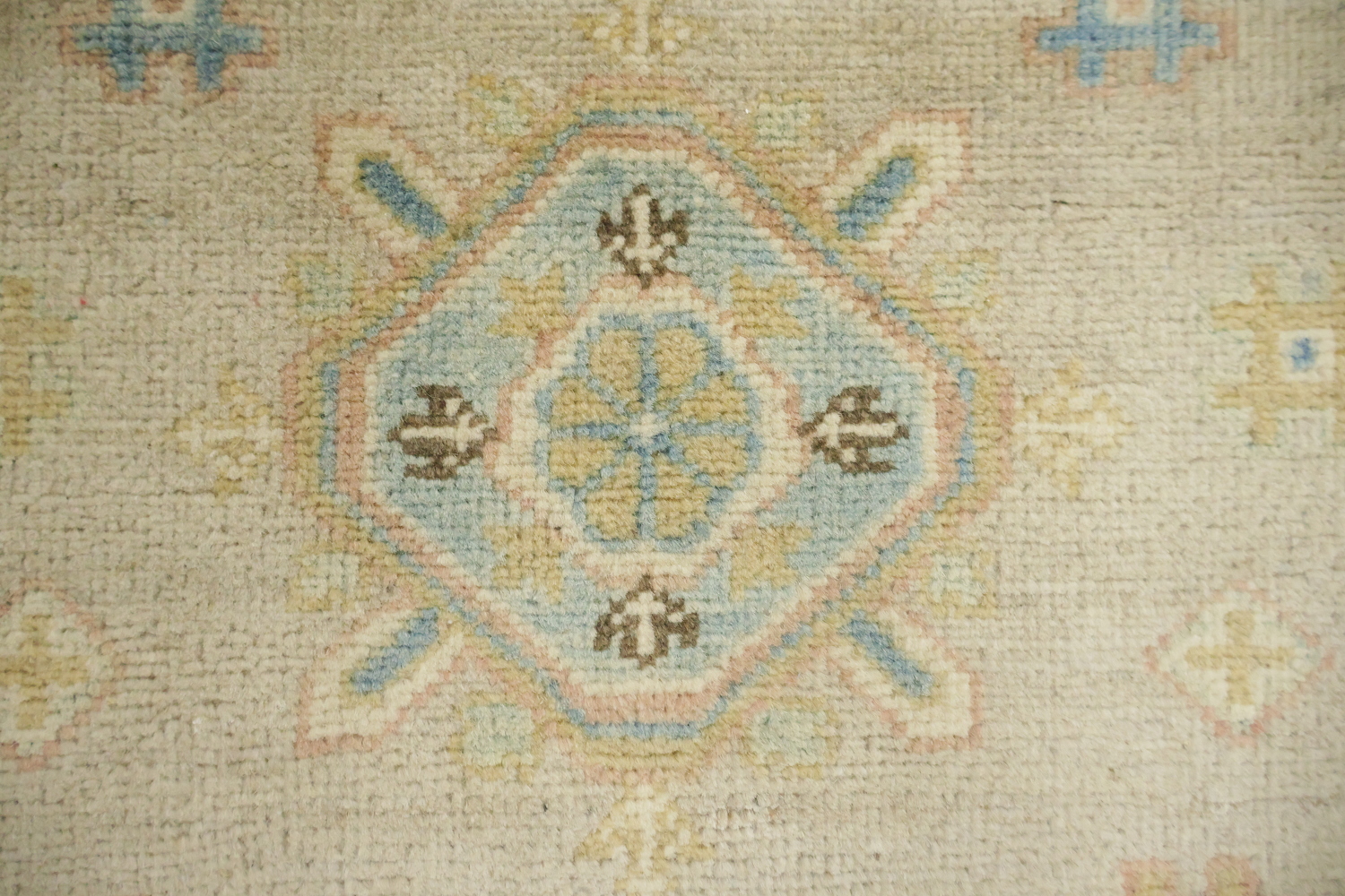 Traditional Light Grey Kazak Pakistani Rug with Delicate Blue and Orange Motifs 6'x9'