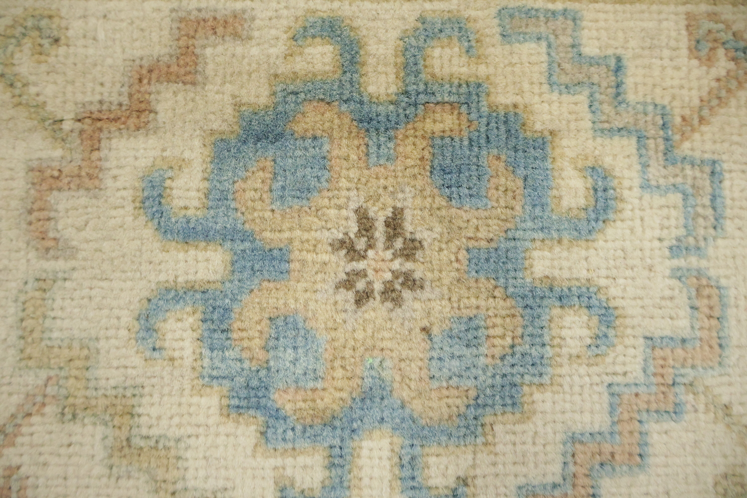 Traditional Light Grey Kazak Pakistani Rug with Delicate Blue and Orange Motifs 6'x9'