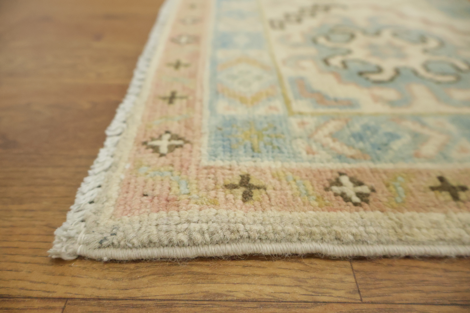 Traditional Light Grey Kazak Pakistani Rug with Delicate Blue and Orange Motifs 6'x9'