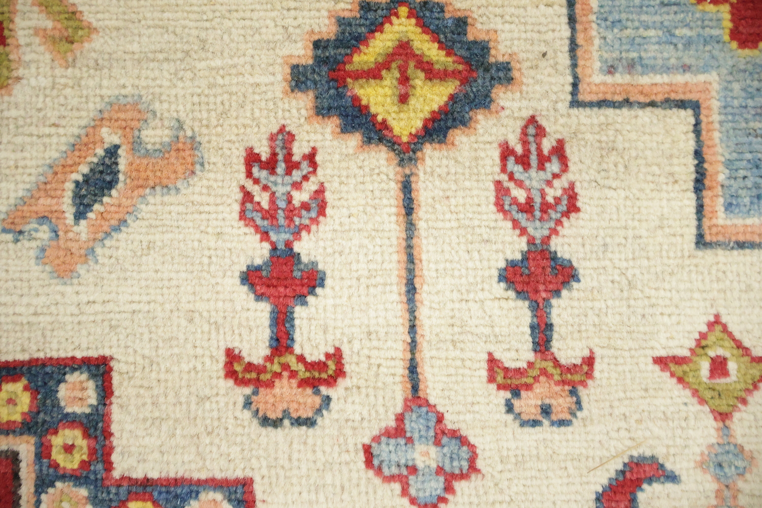Luxurious Handmade Kazak Wool Rug with Vibrant Red and Beige Tones 9x12