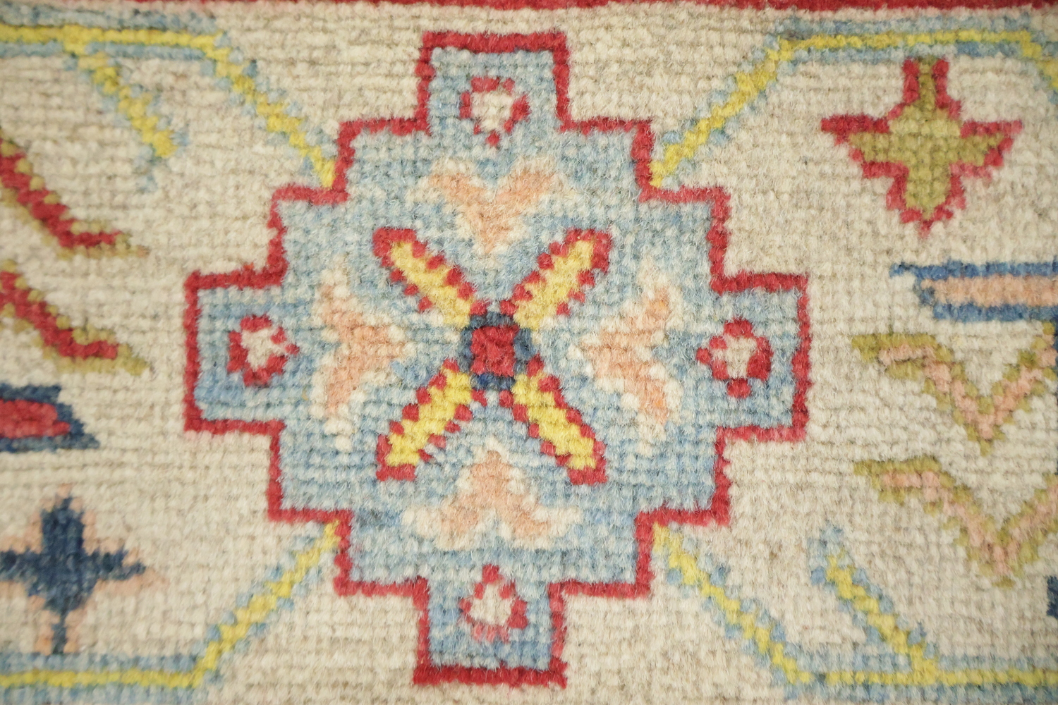 Luxurious Handmade Kazak Wool Rug with Vibrant Red and Beige Tones 9x12