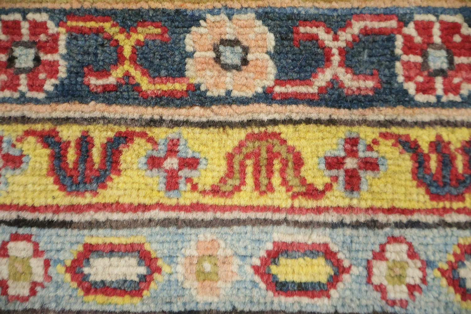 Luxurious Handmade Kazak Wool Rug with Vibrant Red and Beige Tones 9x12