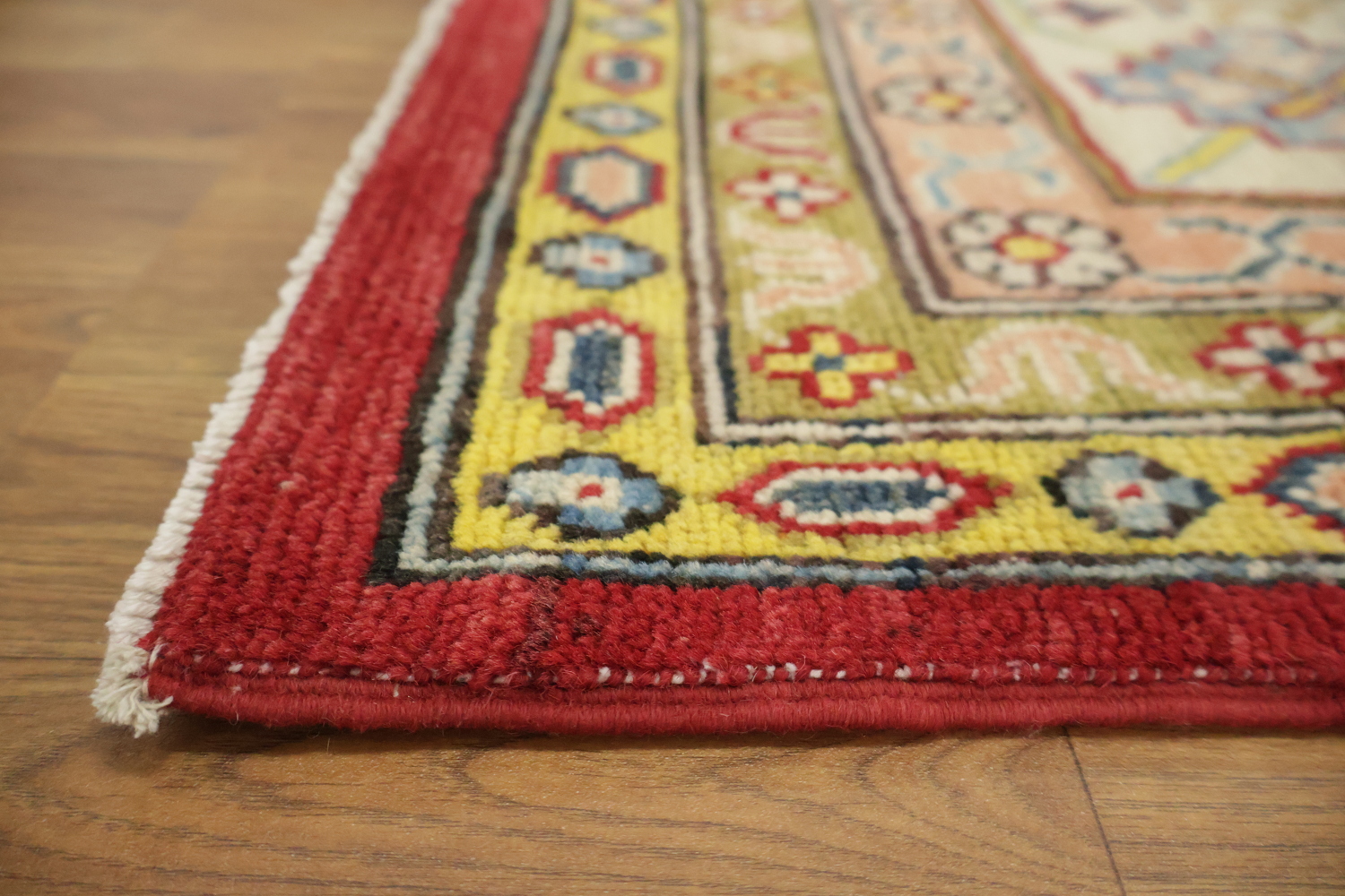Luxurious Handmade Kazak Wool Rug with Vibrant Red and Beige Tones 9x12