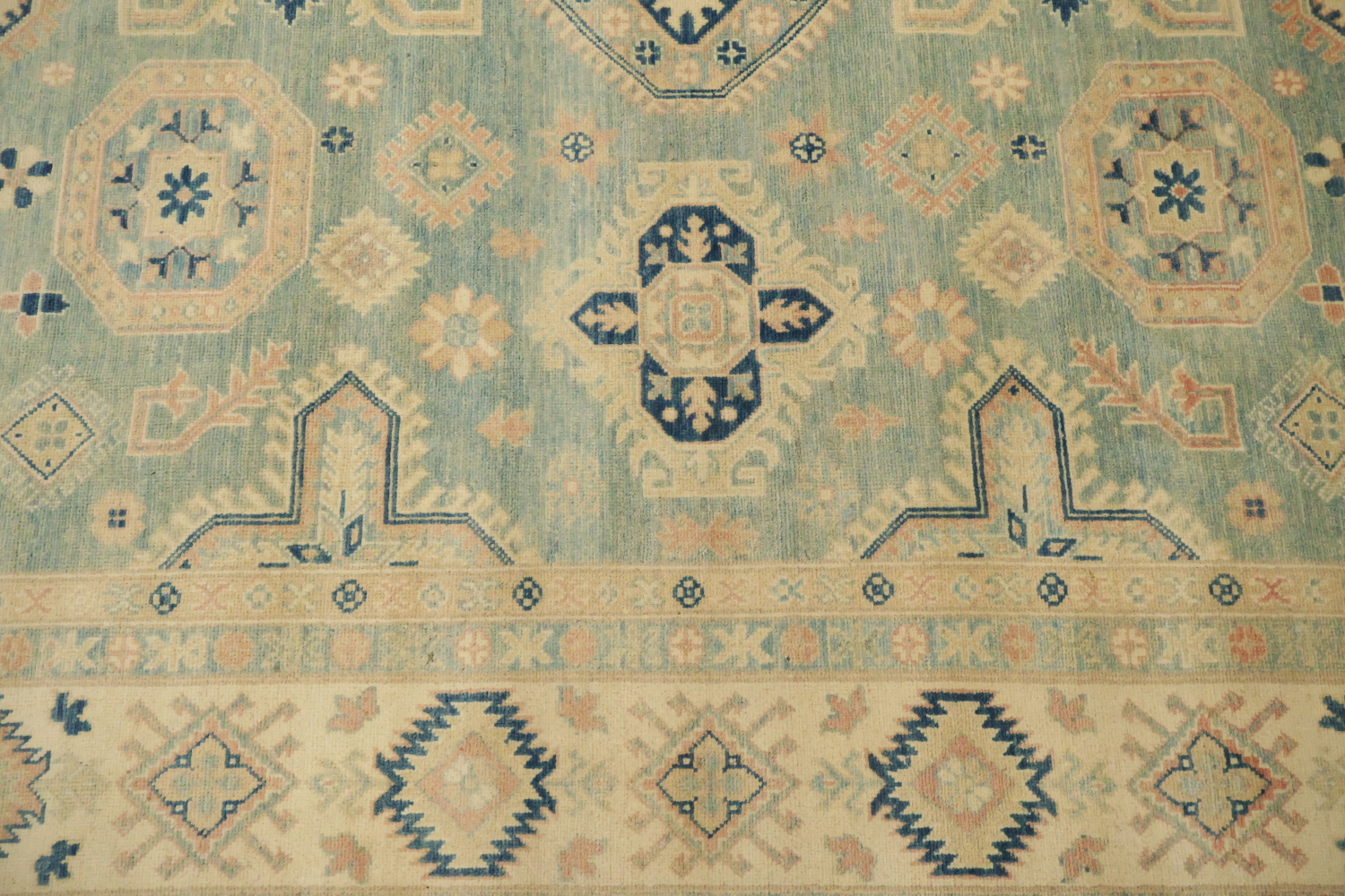 Classic Turkish-Inspired Light Blue Kazak Rug with Muted Earthy Hues 8x10