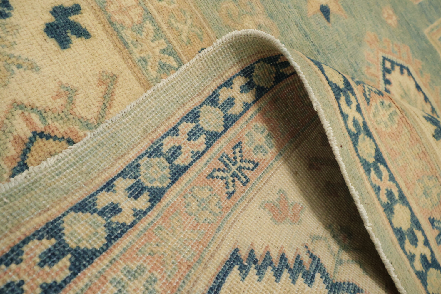 Classic Turkish-Inspired Light Blue Kazak Rug with Muted Earthy Hues 8x10