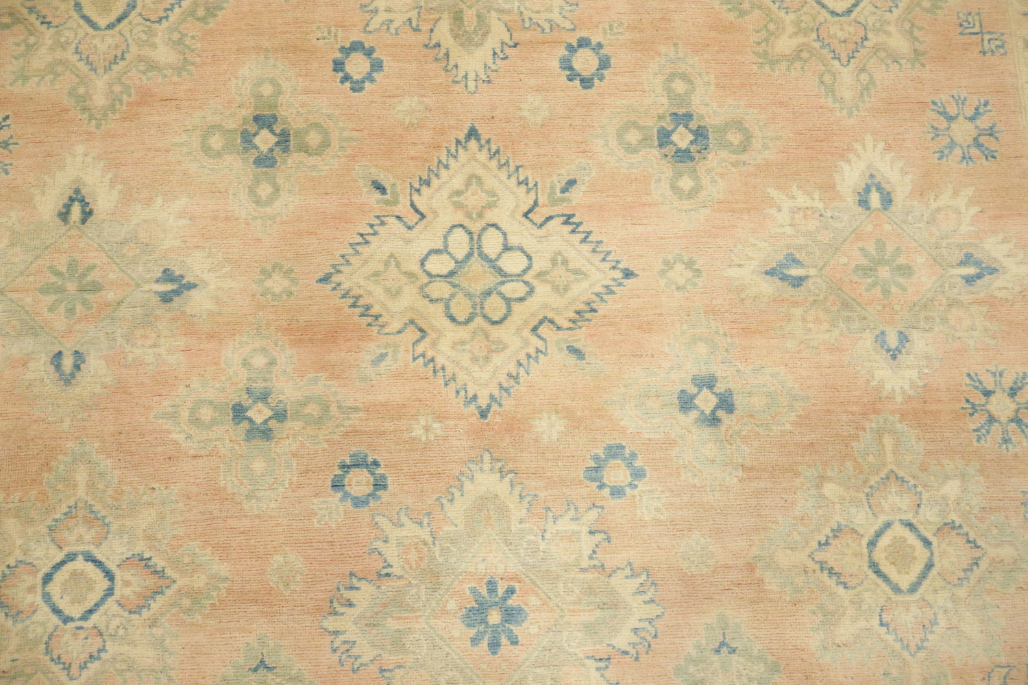 Muted Coral Salmon Kazak Traditional Rug with Subtle Hues and Intricate Designs 8'x10'