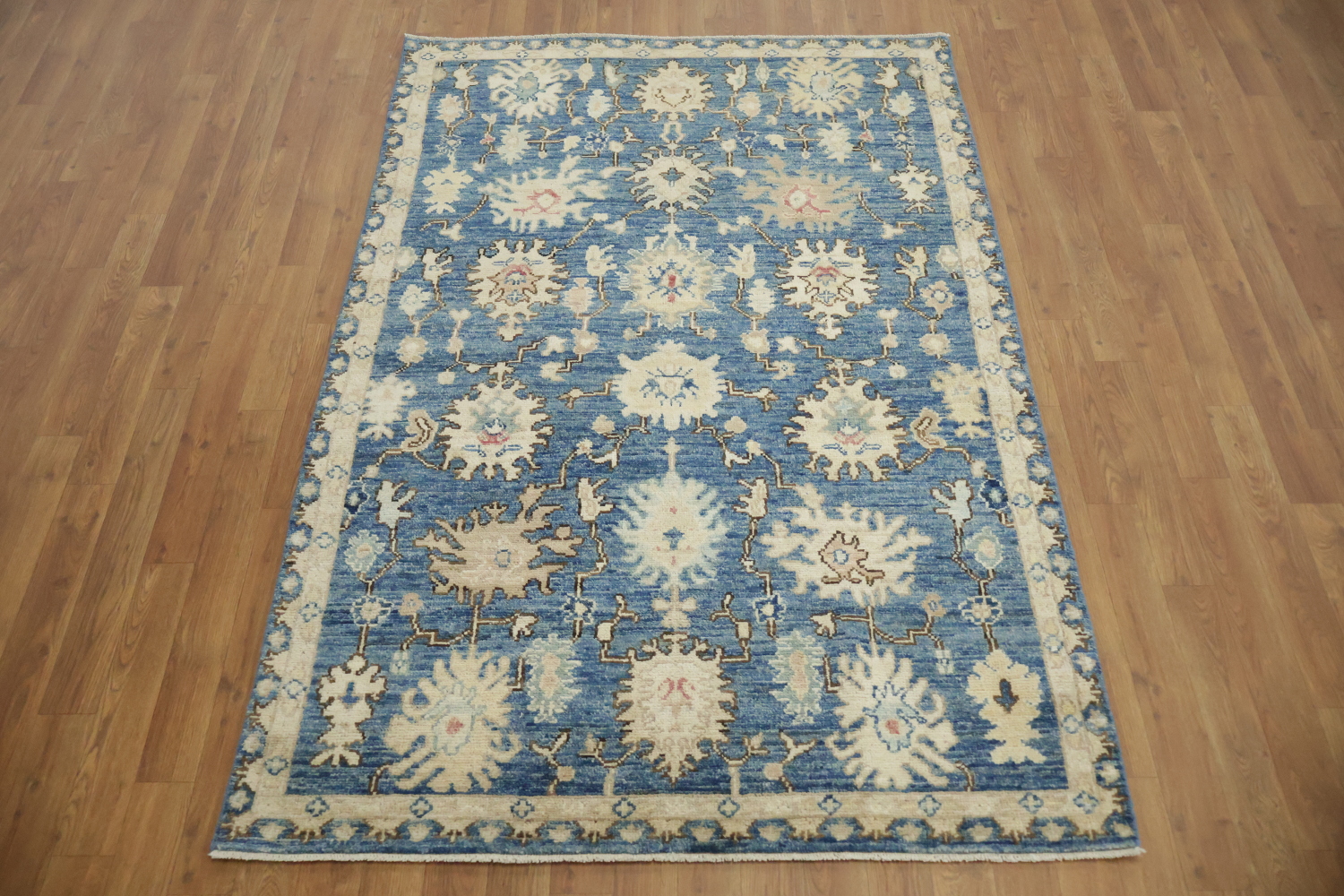 Classic Blue Area Rug with Intricate Floral Design Details