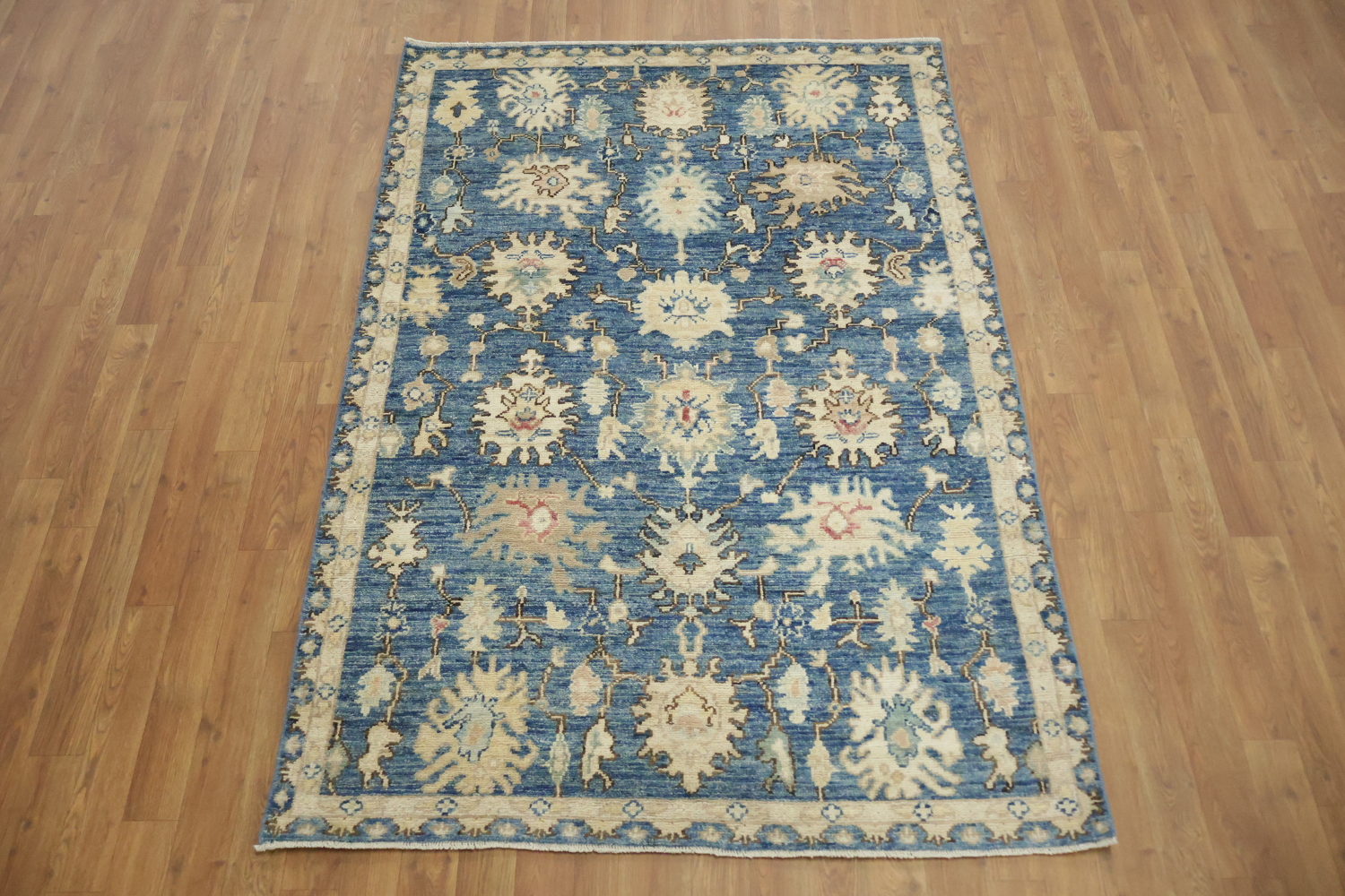Classic Blue Area Rug with Intricate Floral Design Details