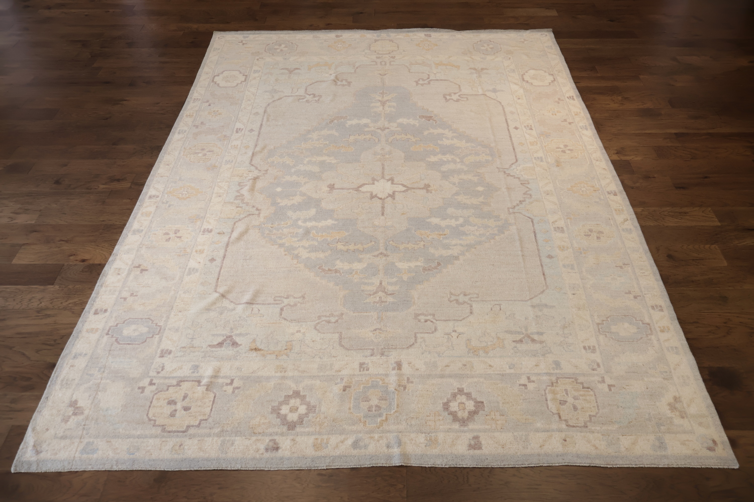 Vintage-style beige Wool Oriental Oushak rug with intricate geometric patterns 10x14
