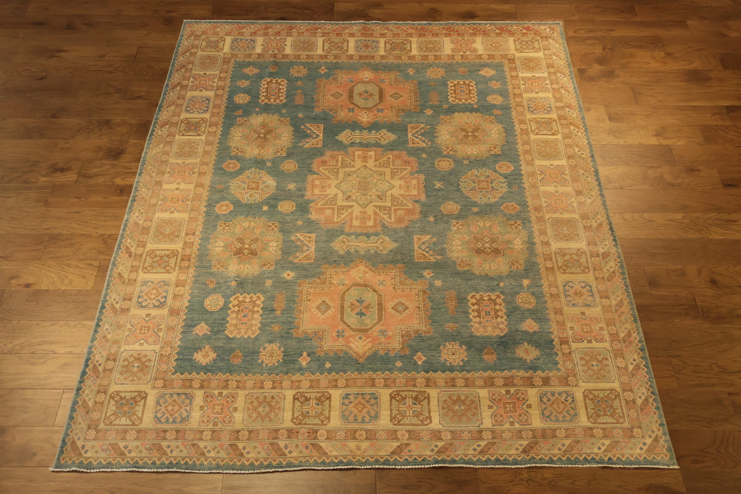 Elegant Persian-inspired rug in muted blue and beige tones for classic decor 8x10