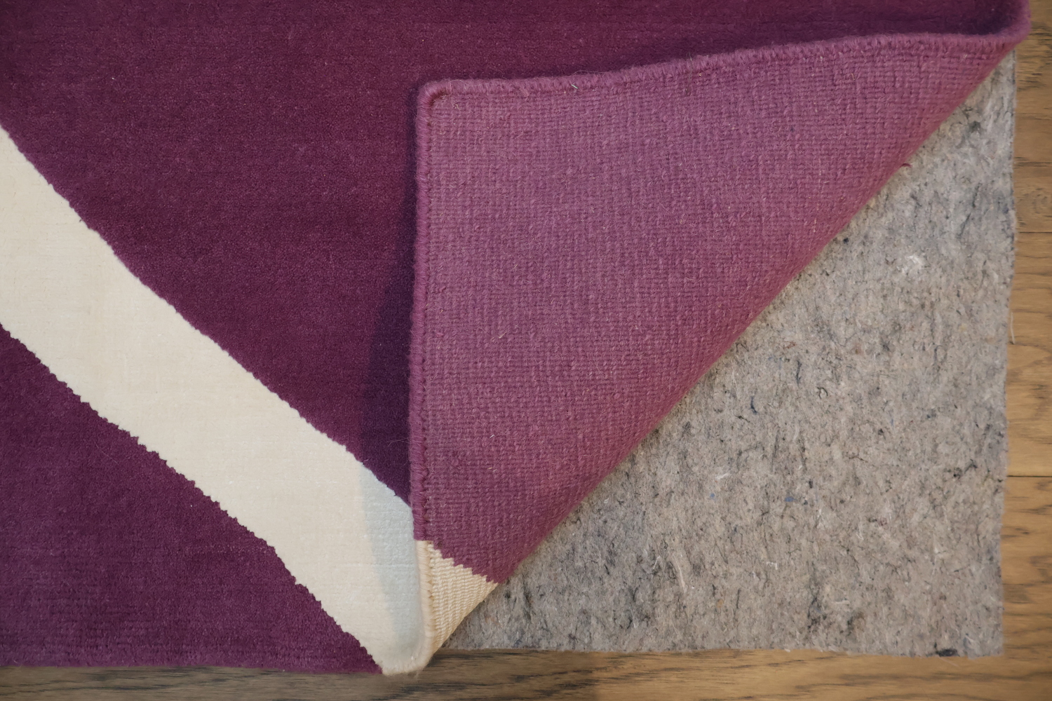 Elegant Purple Nepalese Rug with Wavy White Lines for Modern Interiors 8x10