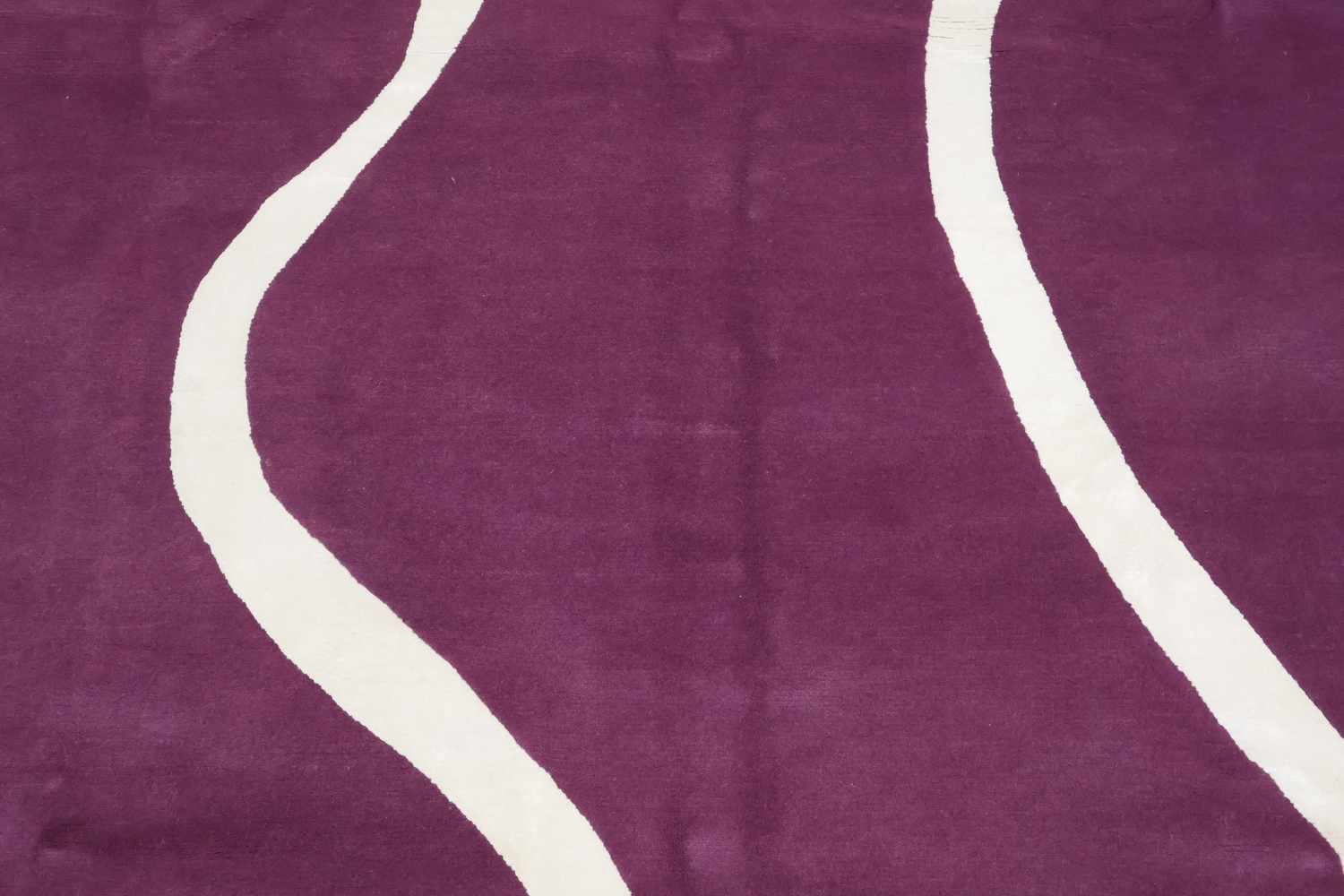 Elegant Purple Nepalese Rug with Wavy White Lines for Modern Interiors 8x10