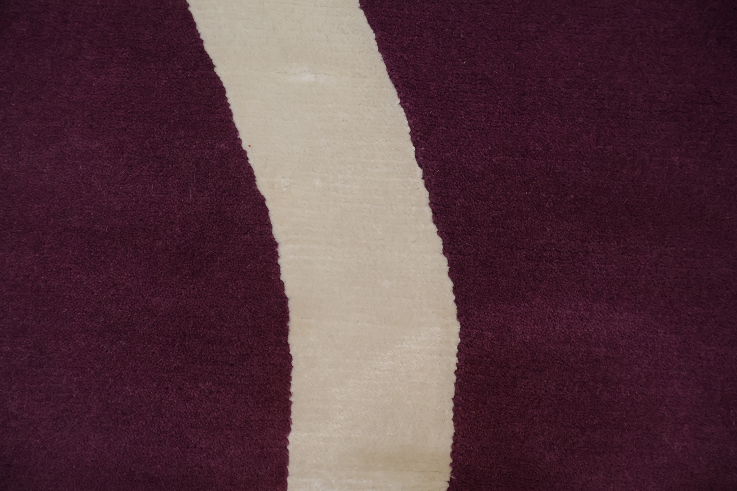 Elegant Purple Nepalese Rug with Wavy White Lines for Modern Interiors 8x10